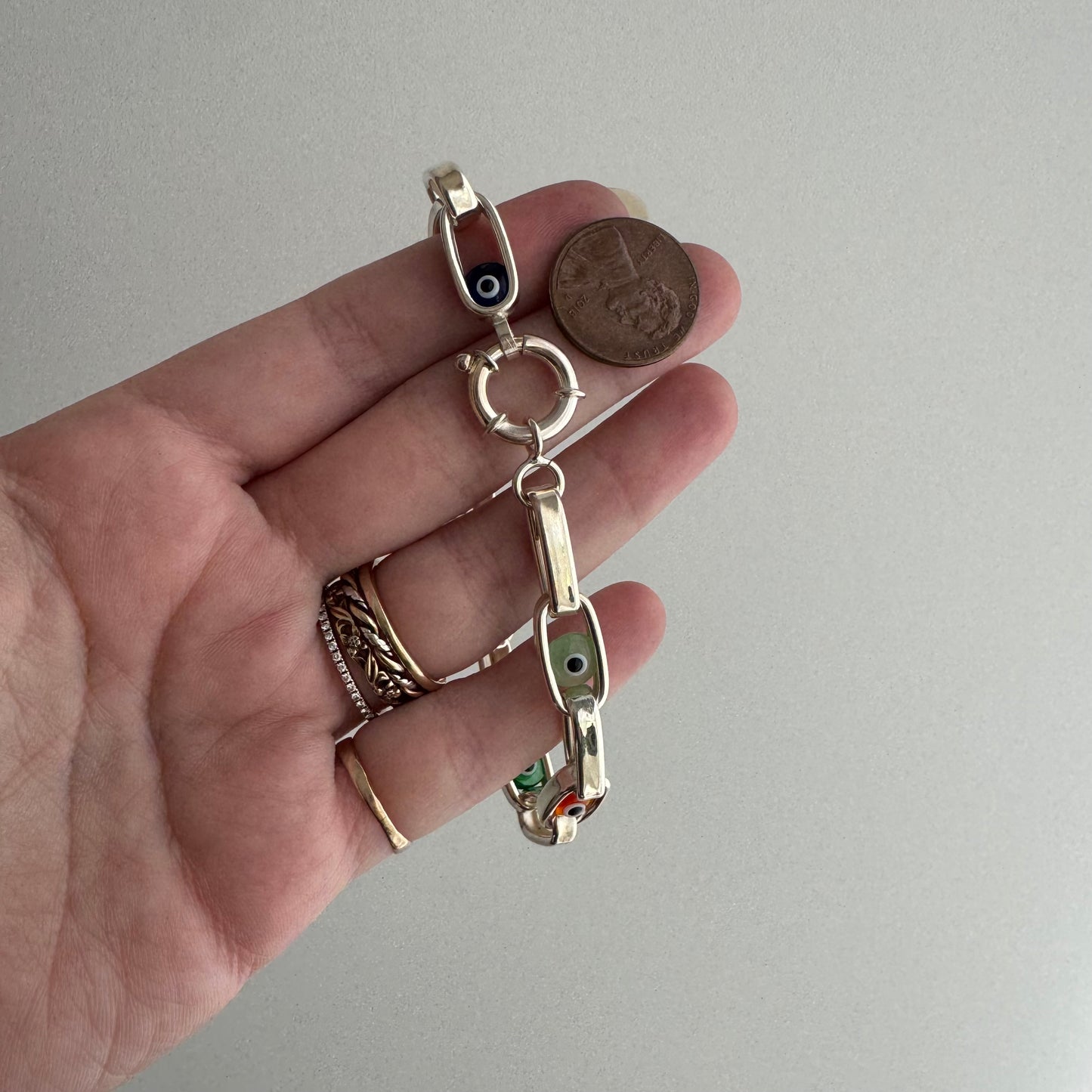 P R E - L O V E D // floating eyes / sterling silver paperclip chain bracelet with evil eyes / 7.75", 10.2g