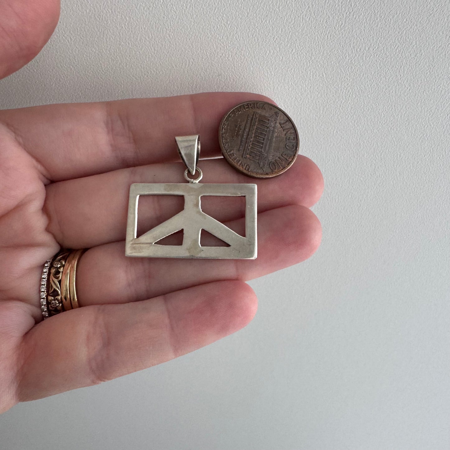 V I N T A G E // after justice / sterling silver rectangular peace sign / a pendant