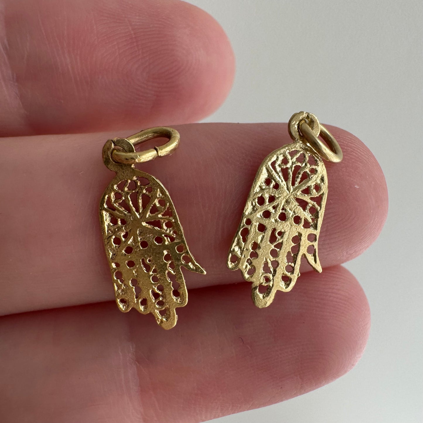 V I N T A G E // powerful palm / 14k yellow gold daisy hamsa / a charm pendant