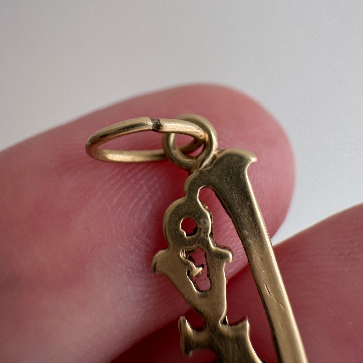 V I N T A G E // LOVE hug / 14k yellow gold love word / a charm pendant