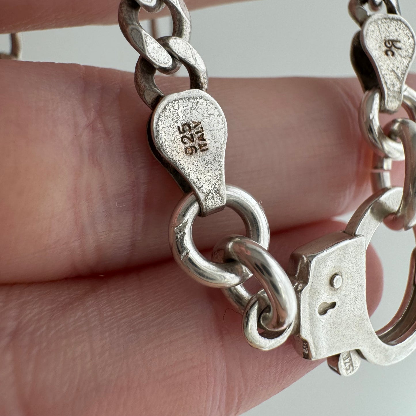 reimagined V I N T A G E // handcuff clasp / re-worked sterling silver figaro chain / 21", 20.4g