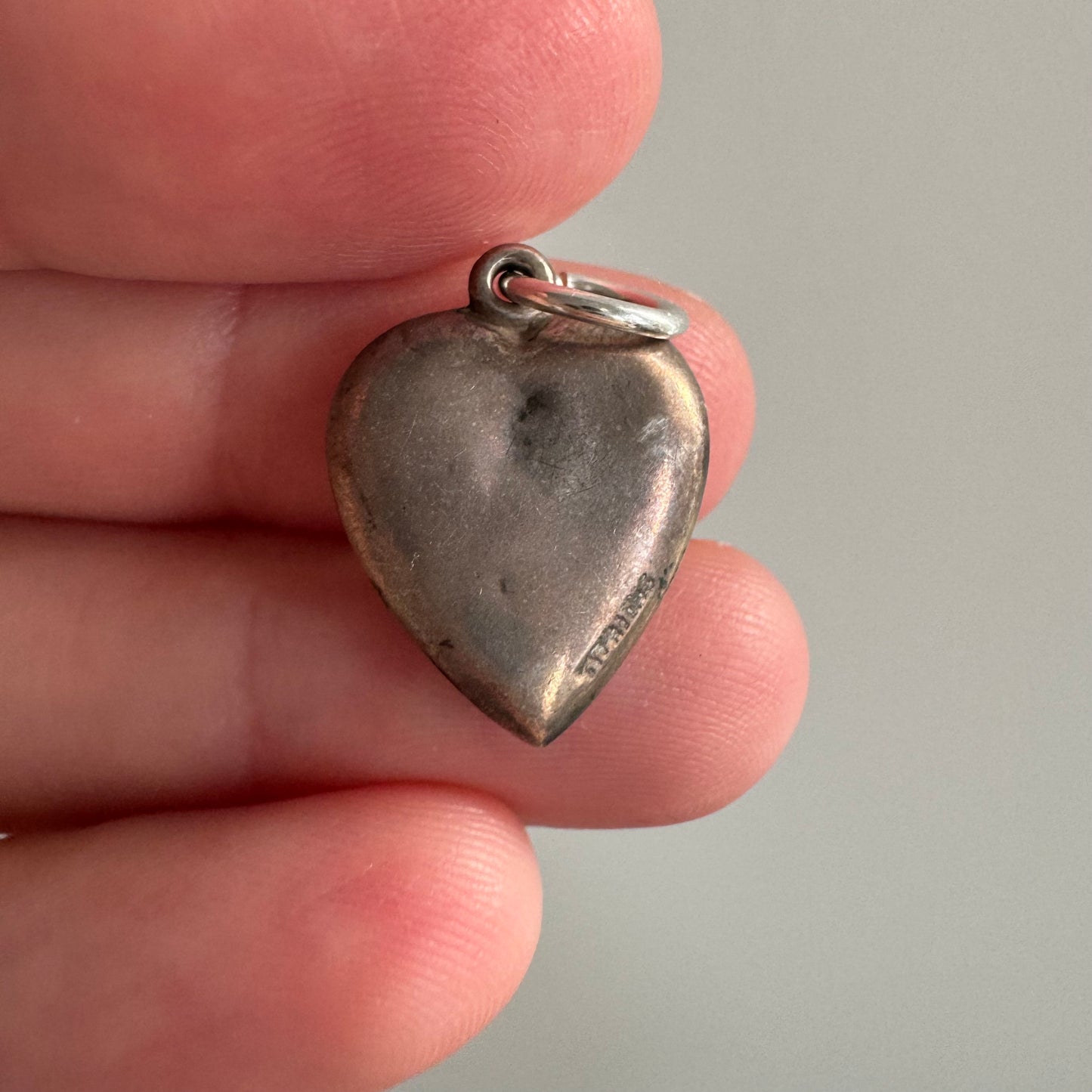RESERVED V I N T A G E // your hand in mine / sterling silver puffy heart with handshake motif / a charm or pendant