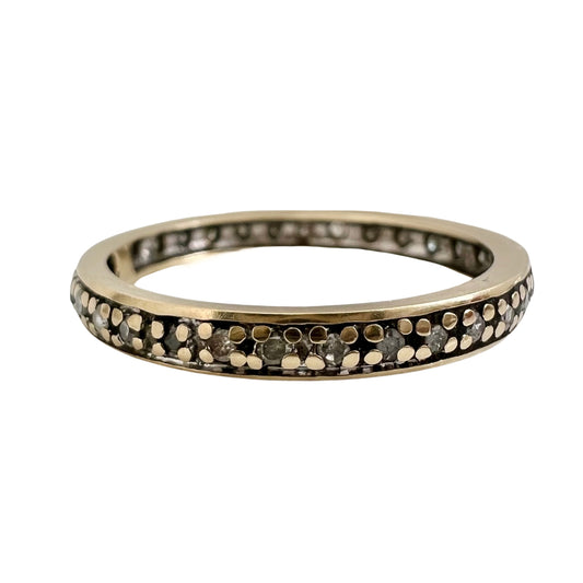 V I N T A G E // infinite floral / almost floral 0.25 tcw diamonds and 9k gold eternity band / size 7.5