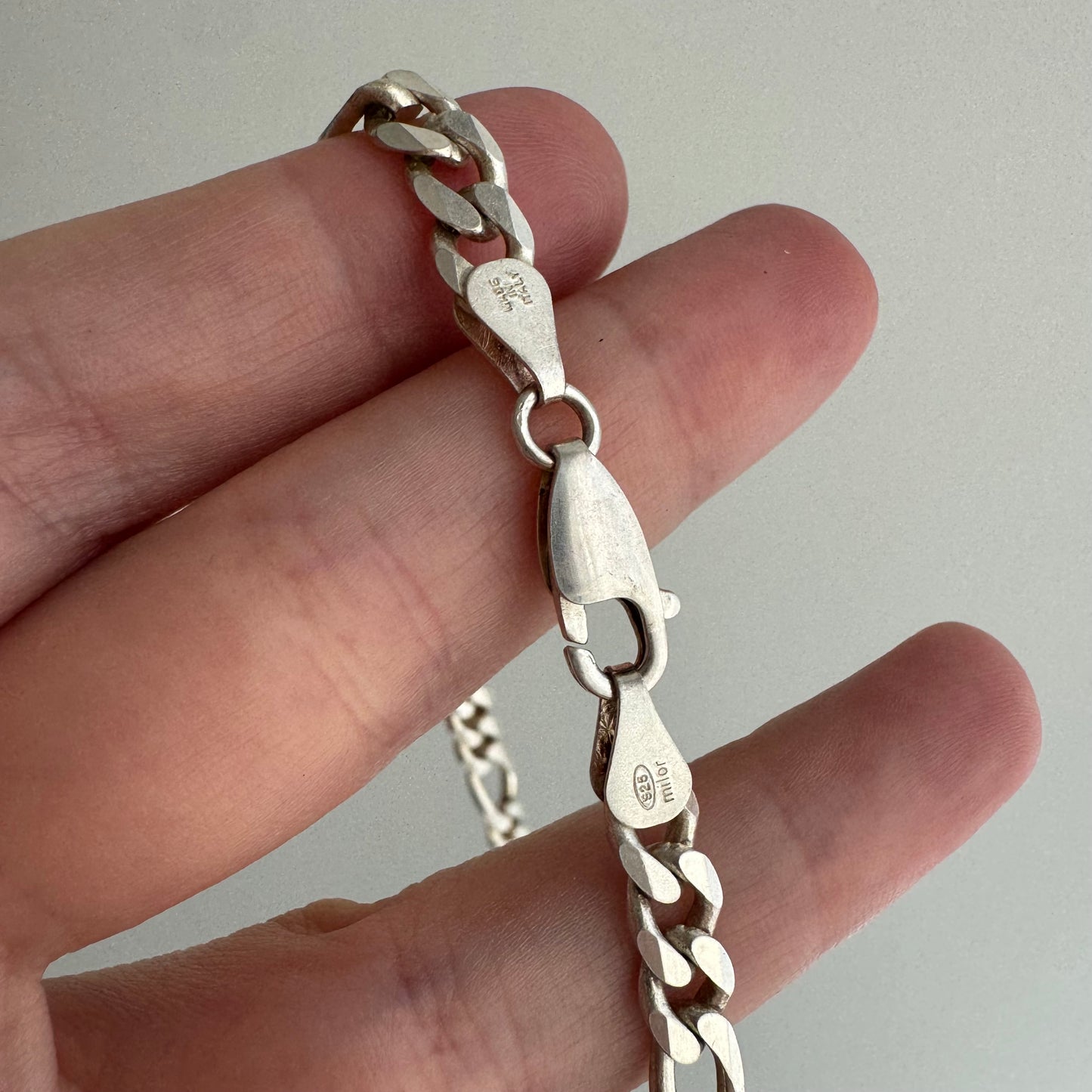 V I N T A G E // bezeled stations / Italy sterling silver figaro chain with topaz stations / 24", 31g