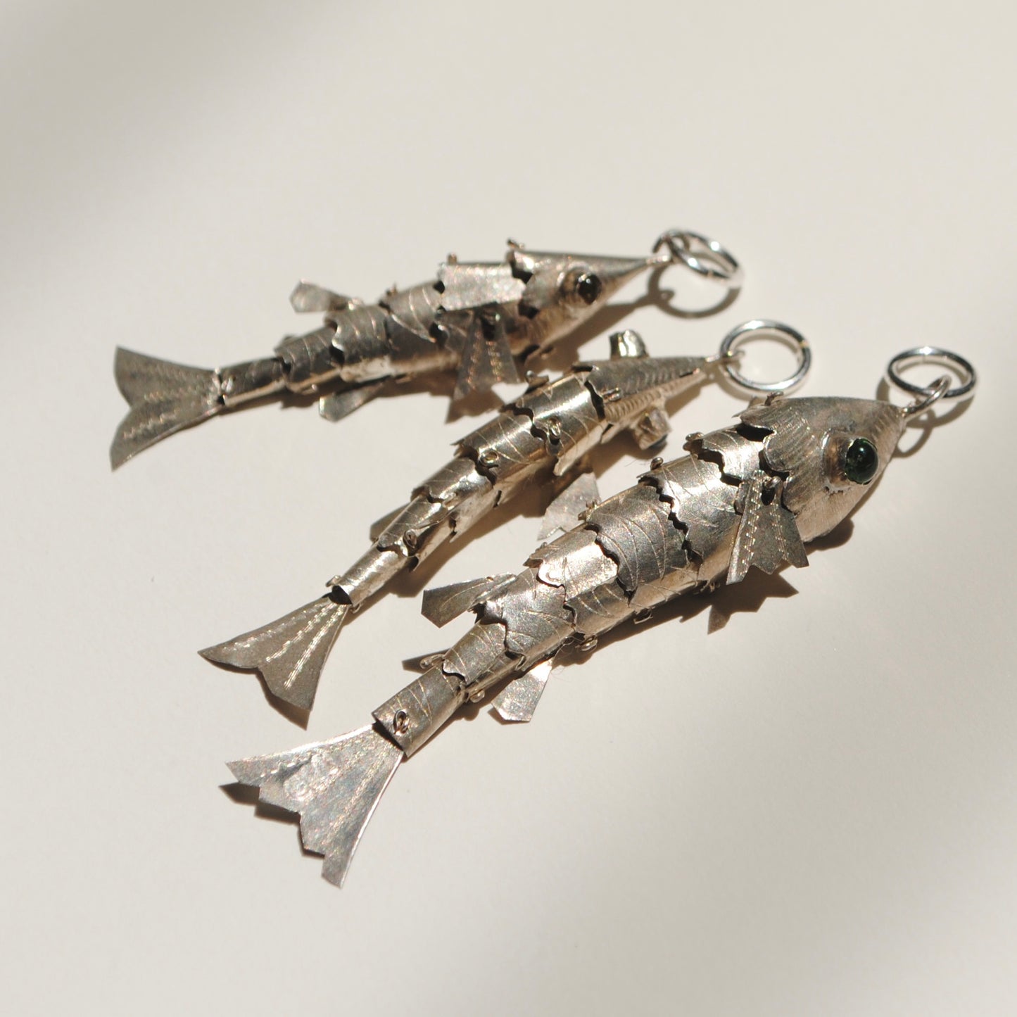 V I N T A G E // lucky catch / sterling silver articulated wiggle fish pendants