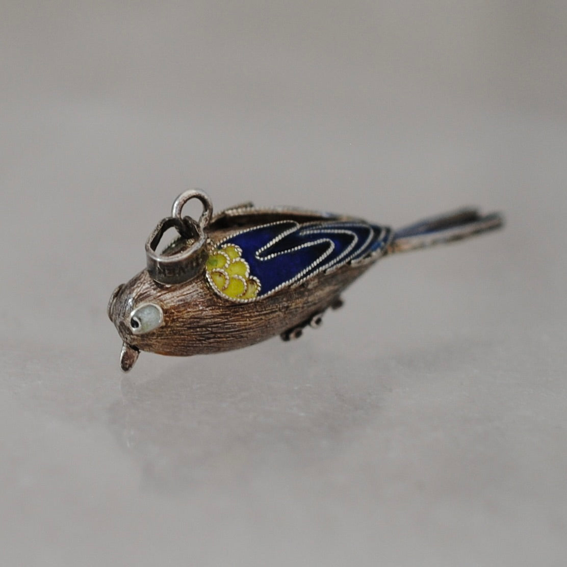 V I N T A G E // winged determination / silver and cloisonne bird / a pendant