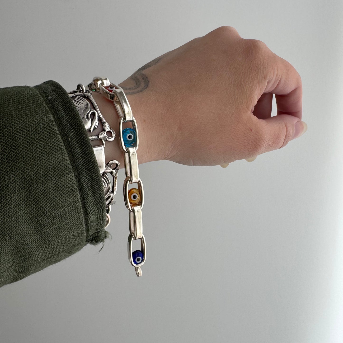 P R E - L O V E D // floating eyes / sterling silver paperclip chain bracelet with evil eyes / 7.75", 10.2g