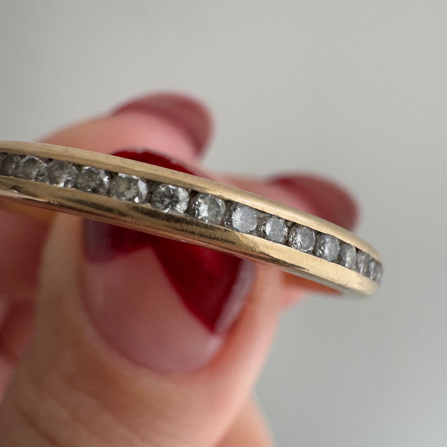 V I N T A G E // sparkly horizon / 14k yellow gold and channel set diamond half eternity band / size 10.75