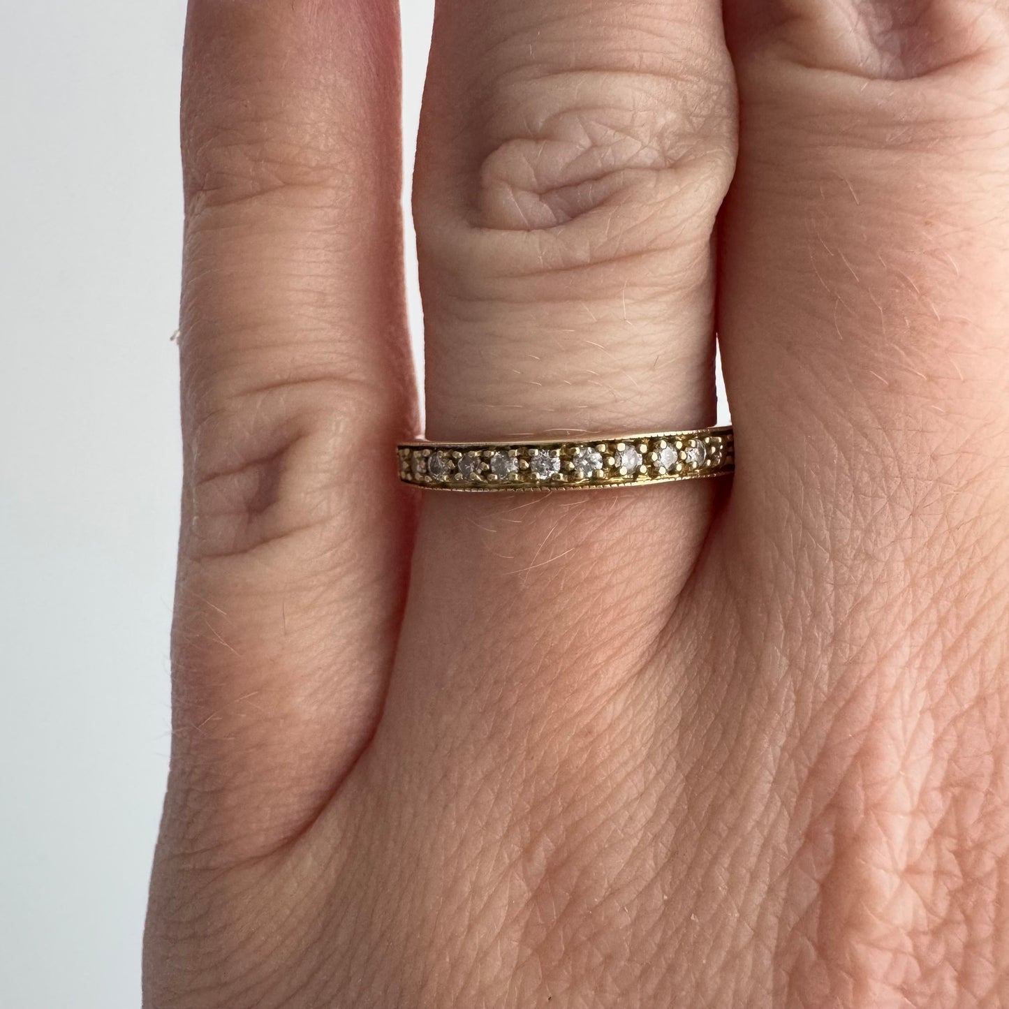 V I N T A G E // all lined up / 10k yellow gold and diamond half eternity band / size 6