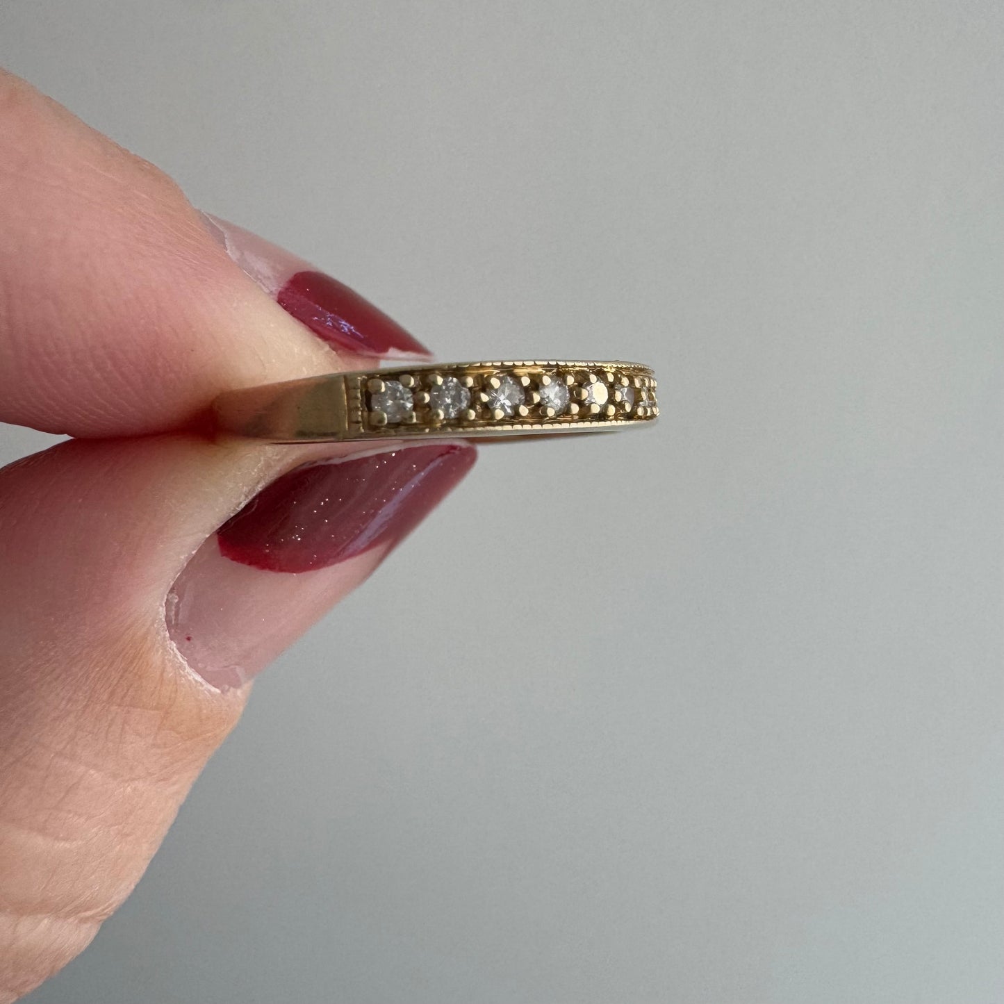 V I N T A G E // all lined up / 10k yellow gold and diamond half eternity band / size 6