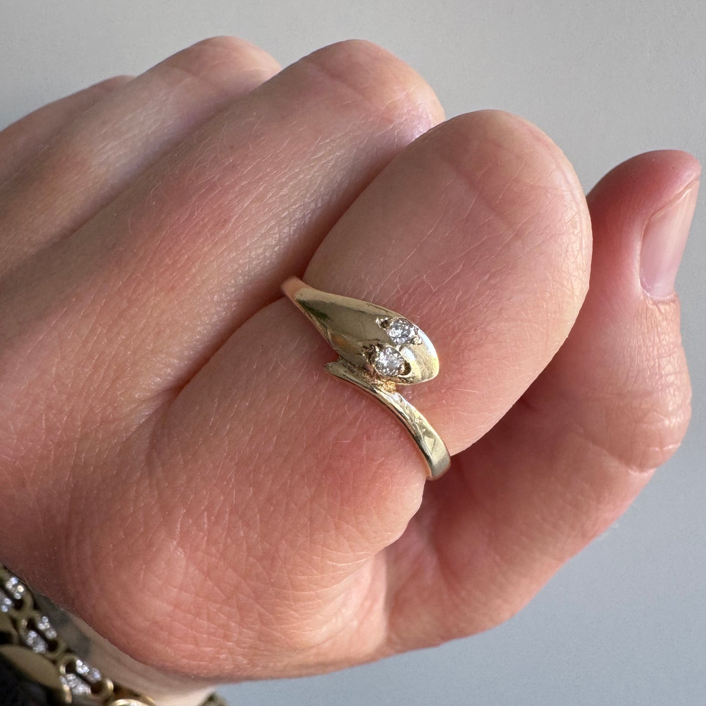 V I N T A G E // slithering stacker / 9k yellow gold and diamond wrap around snake ring / size 7.5
