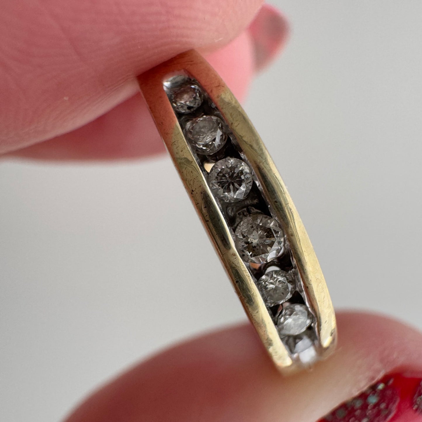 V I N T A G E // lucky seven / 10k yellow gold and channel set diamond half eternity band / size 6.75