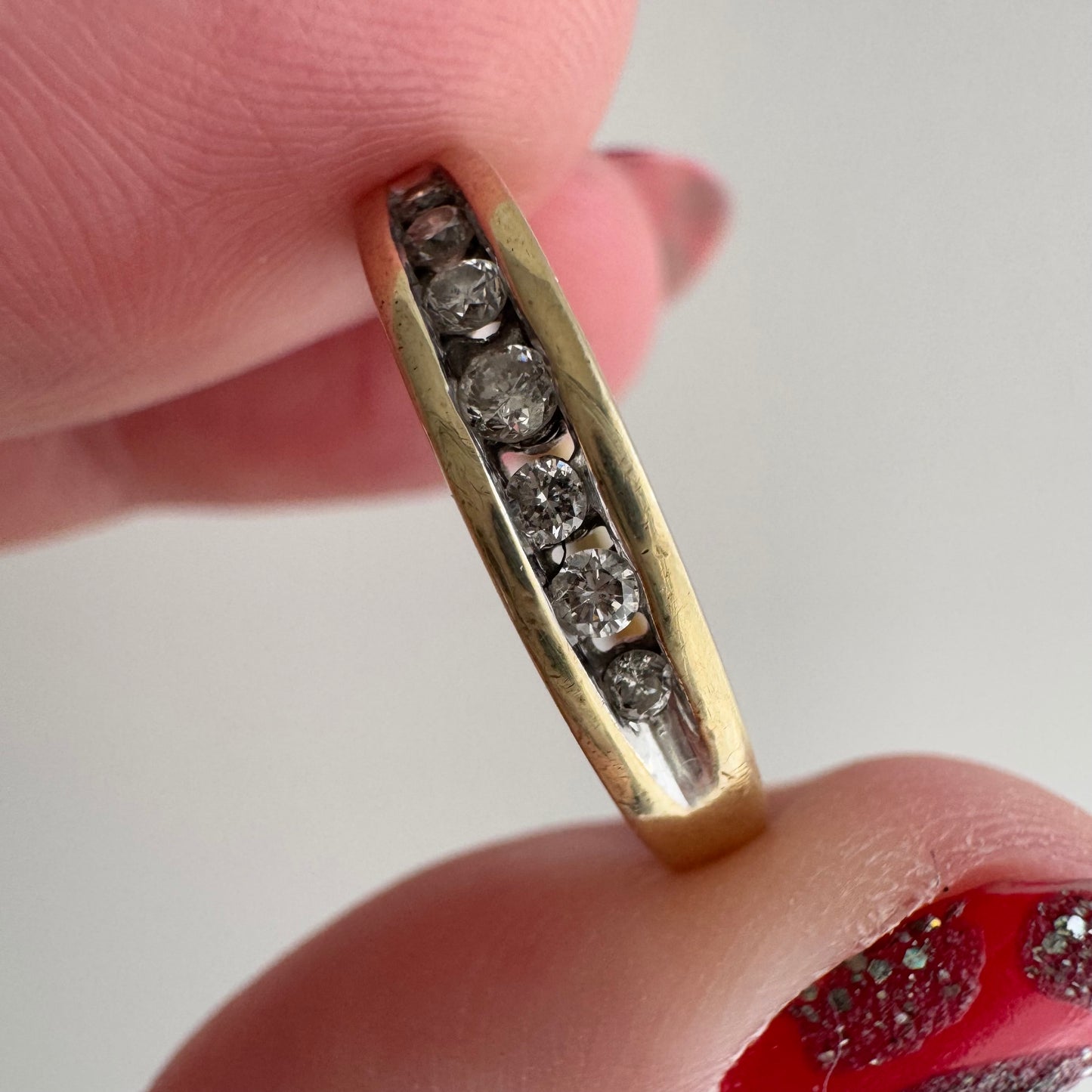 V I N T A G E // lucky seven / 10k yellow gold and channel set diamond half eternity band / size 6.75