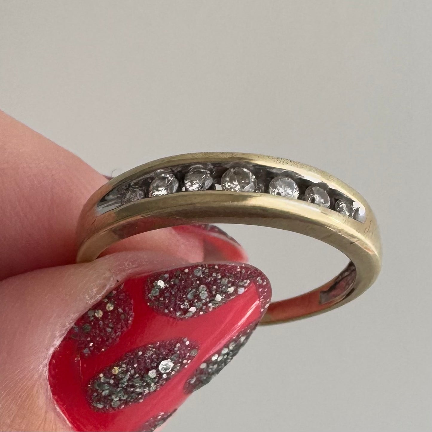 V I N T A G E // lucky seven / 10k yellow gold and channel set diamond half eternity band / size 6.75