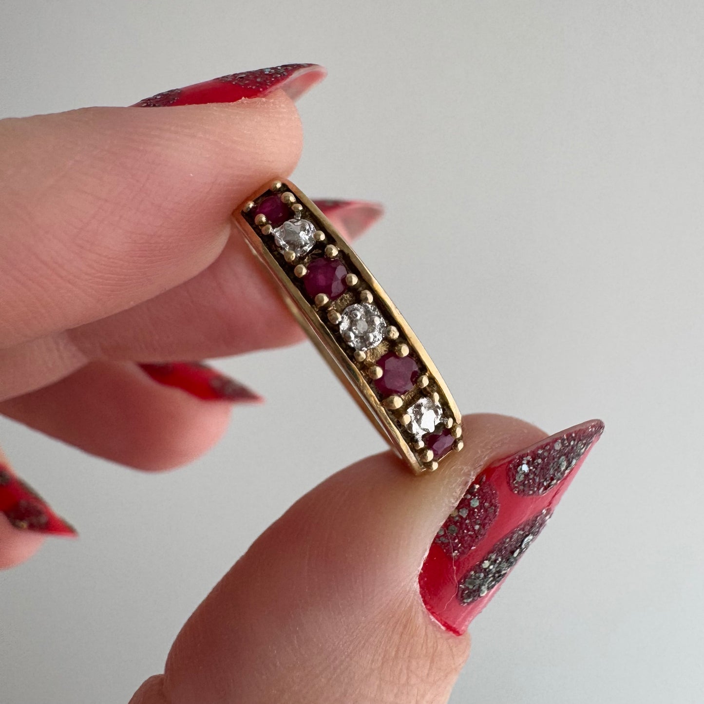 V I N T A G E // five stone illusion / 10k yellow gold + ruby + diamond half eternity band / size 7