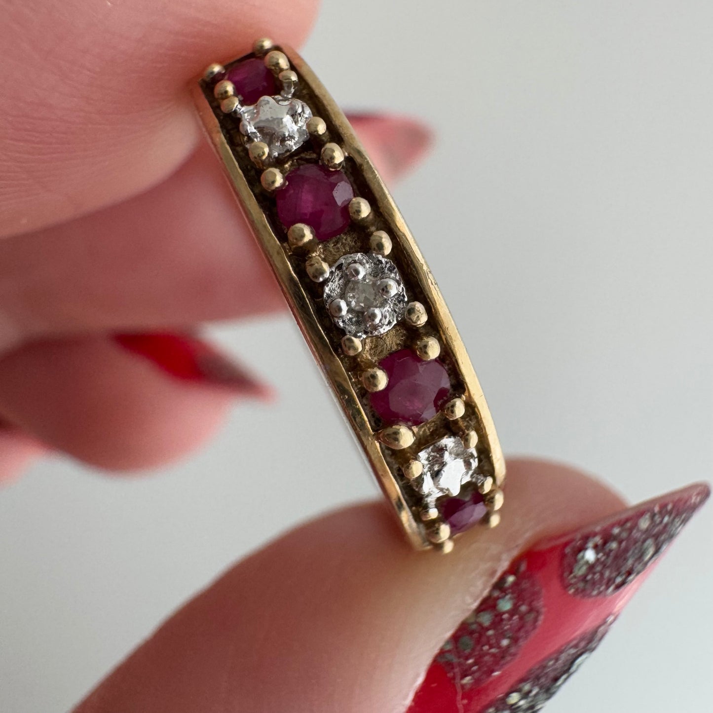 V I N T A G E // five stone illusion / 10k yellow gold + ruby + diamond half eternity band / size 7