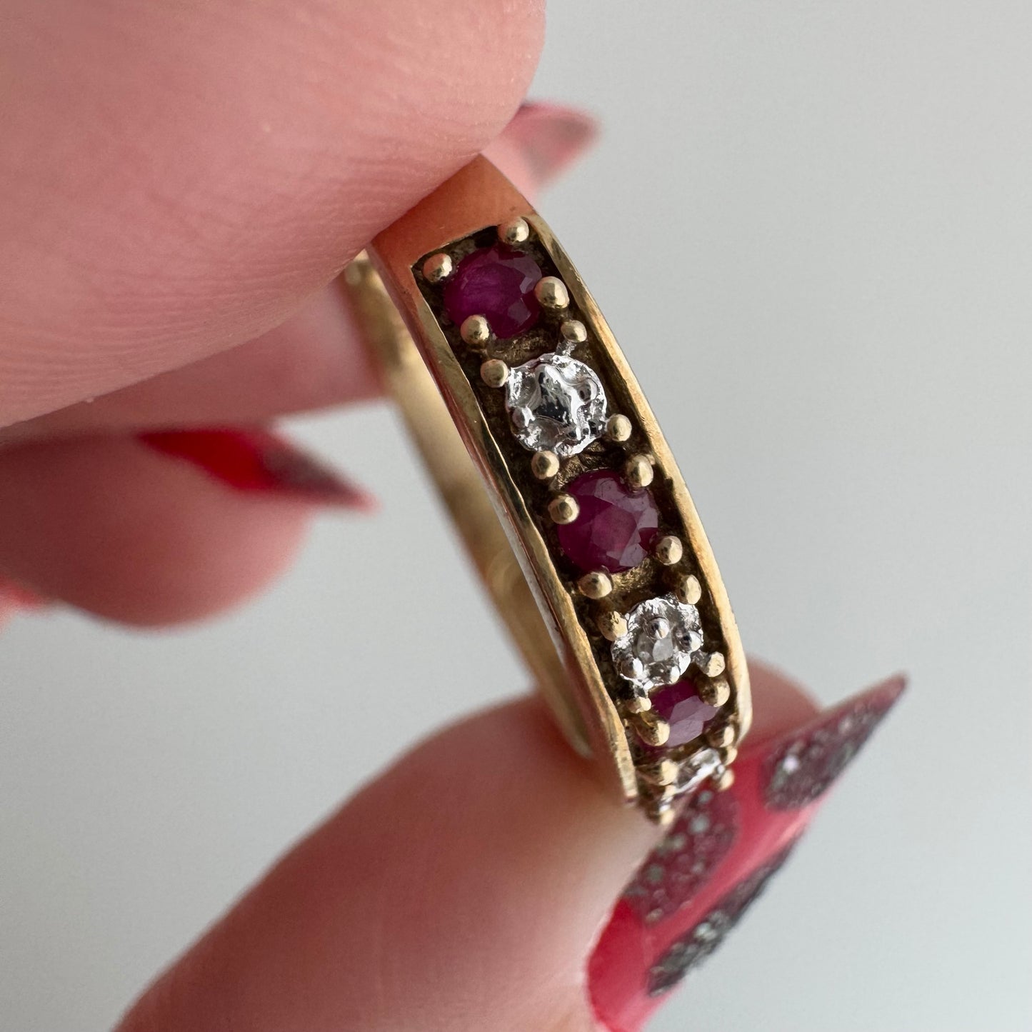 V I N T A G E // five stone illusion / 10k yellow gold + ruby + diamond half eternity band / size 7