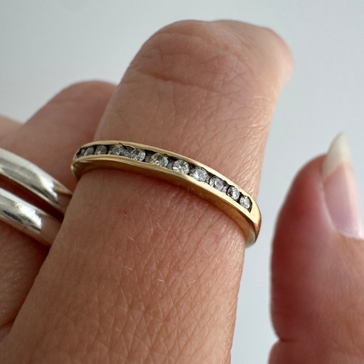 V I N T A G E // eleven sparkles / 14k yellow gold and 11 channel set diamonds / half eternity band / size 7.5