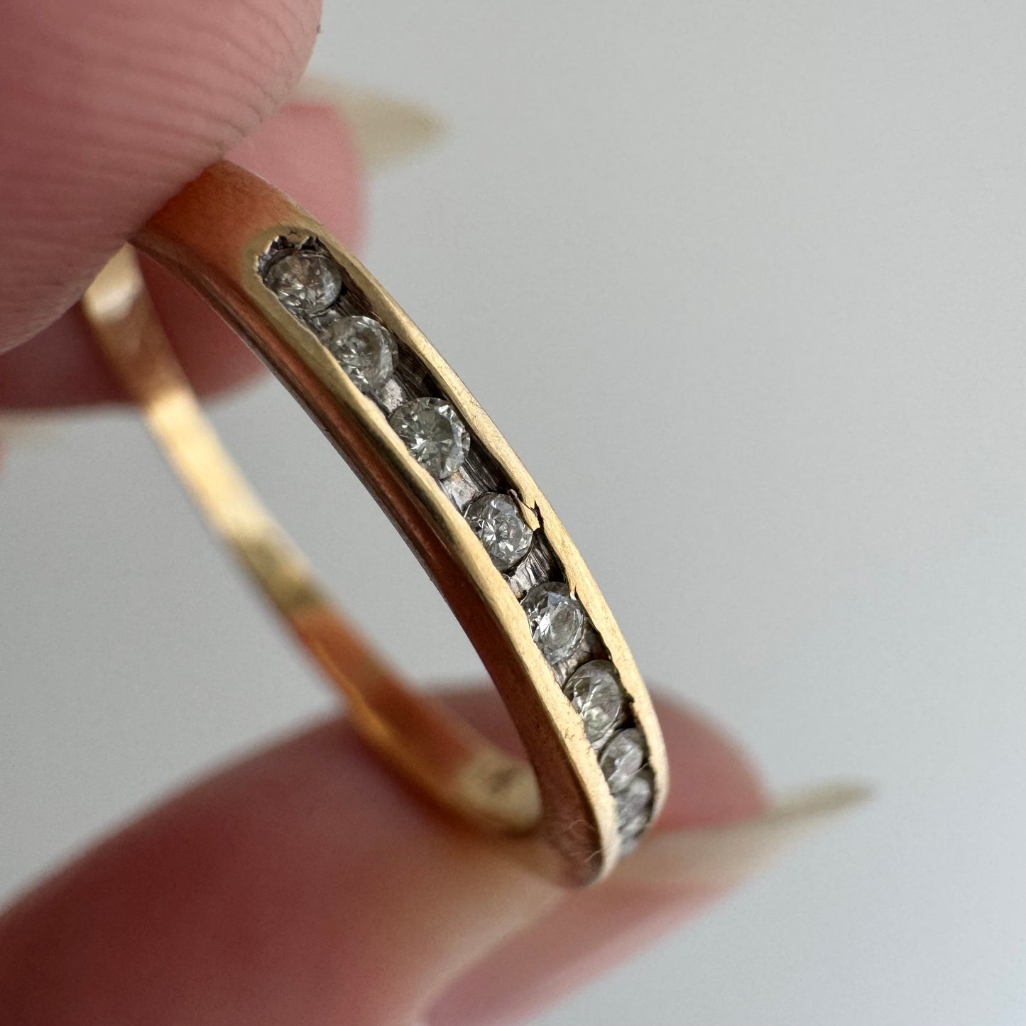 V I N T A G E // eleven sparkles / 14k yellow gold and 11 channel set diamonds / half eternity band / size 7.5