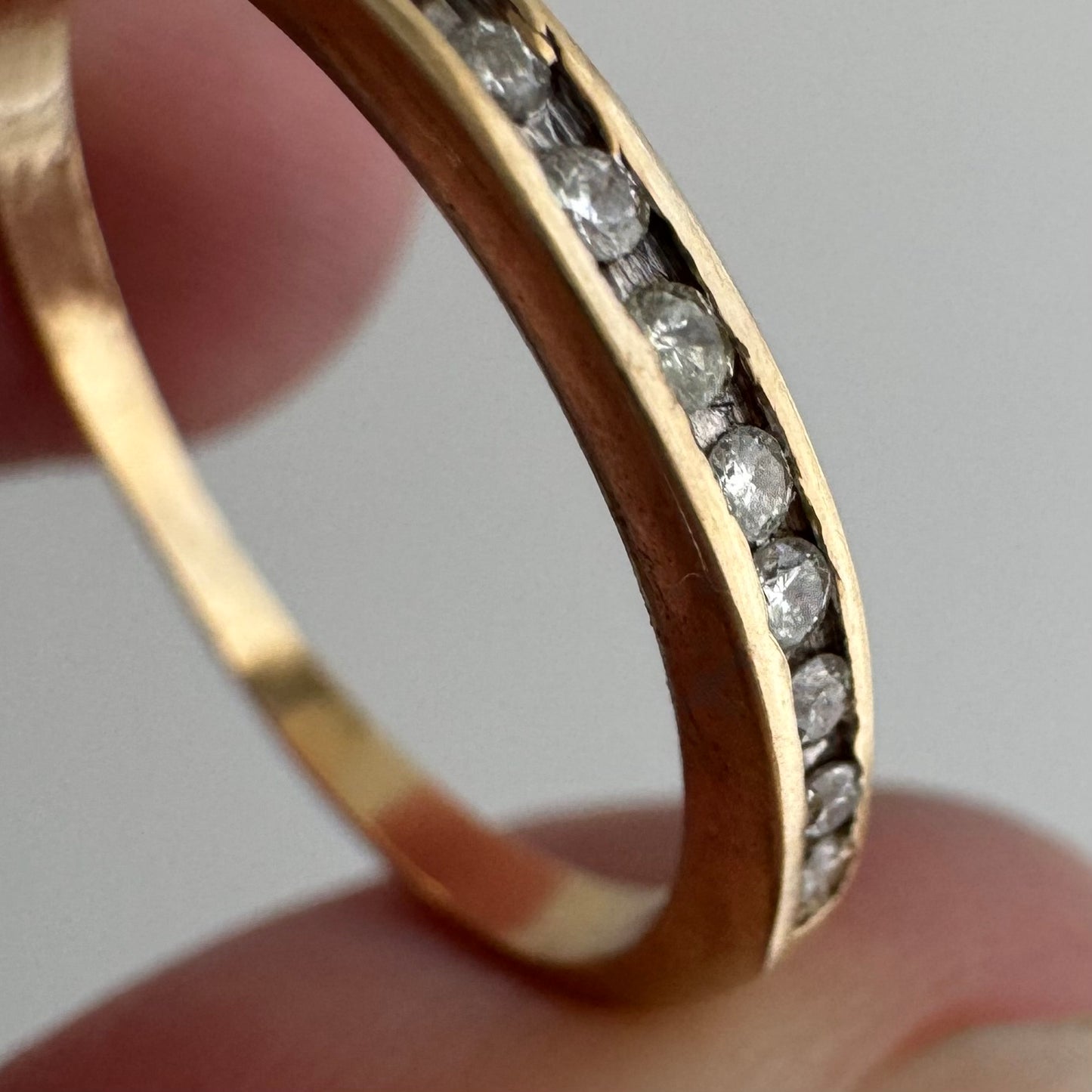 V I N T A G E // eleven sparkles / 14k yellow gold and 11 channel set diamonds / half eternity band / size 7.5