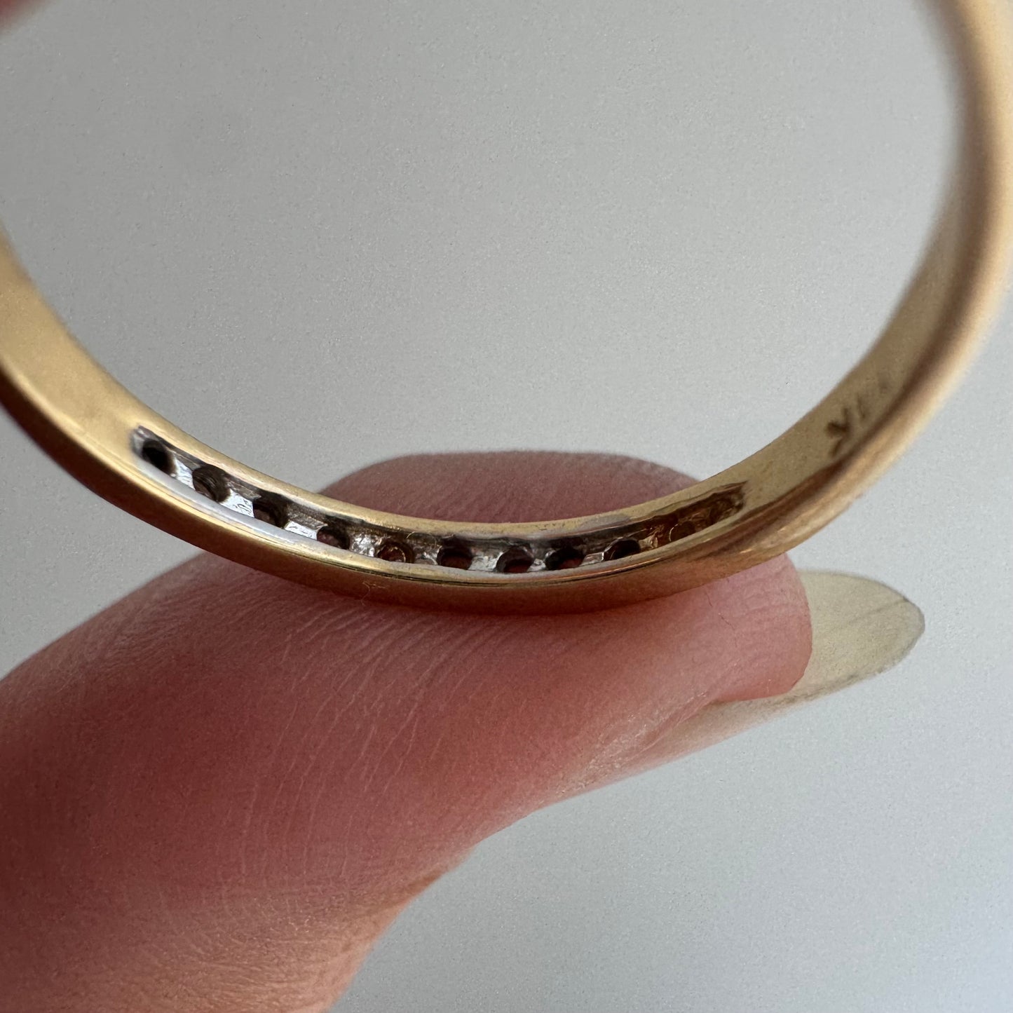 V I N T A G E // eleven sparkles / 14k yellow gold and 11 channel set diamonds / half eternity band / size 7.5