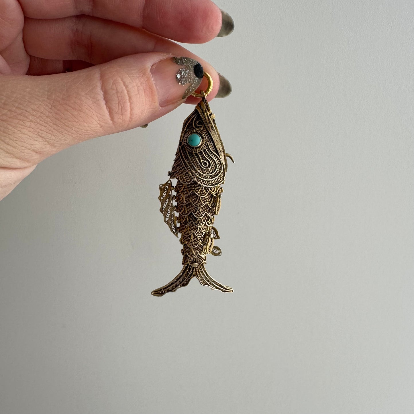 V I N T A G E // lucky catch / gold over sterling silver large articulated wiggle fish with a secret / a pendant