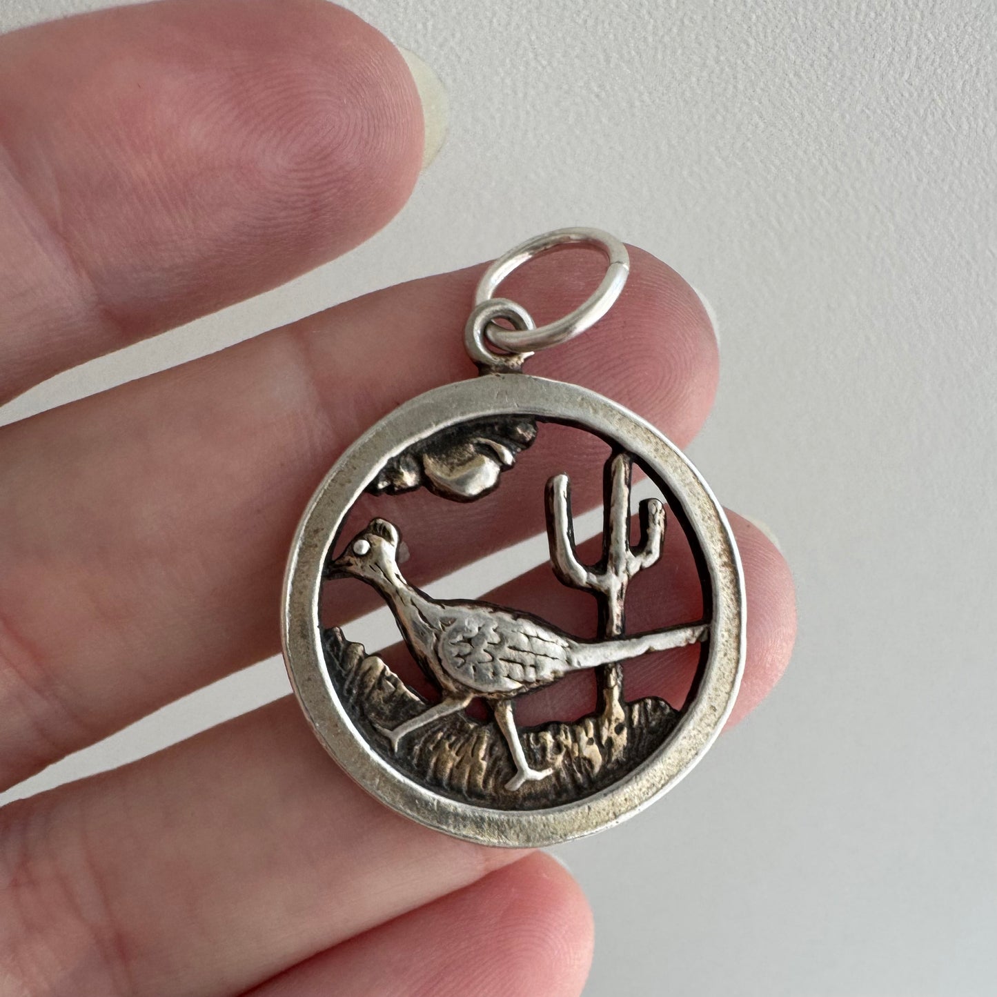 V I N T A G E // slowing down / sterling silver strutting road runner scene / a pendant