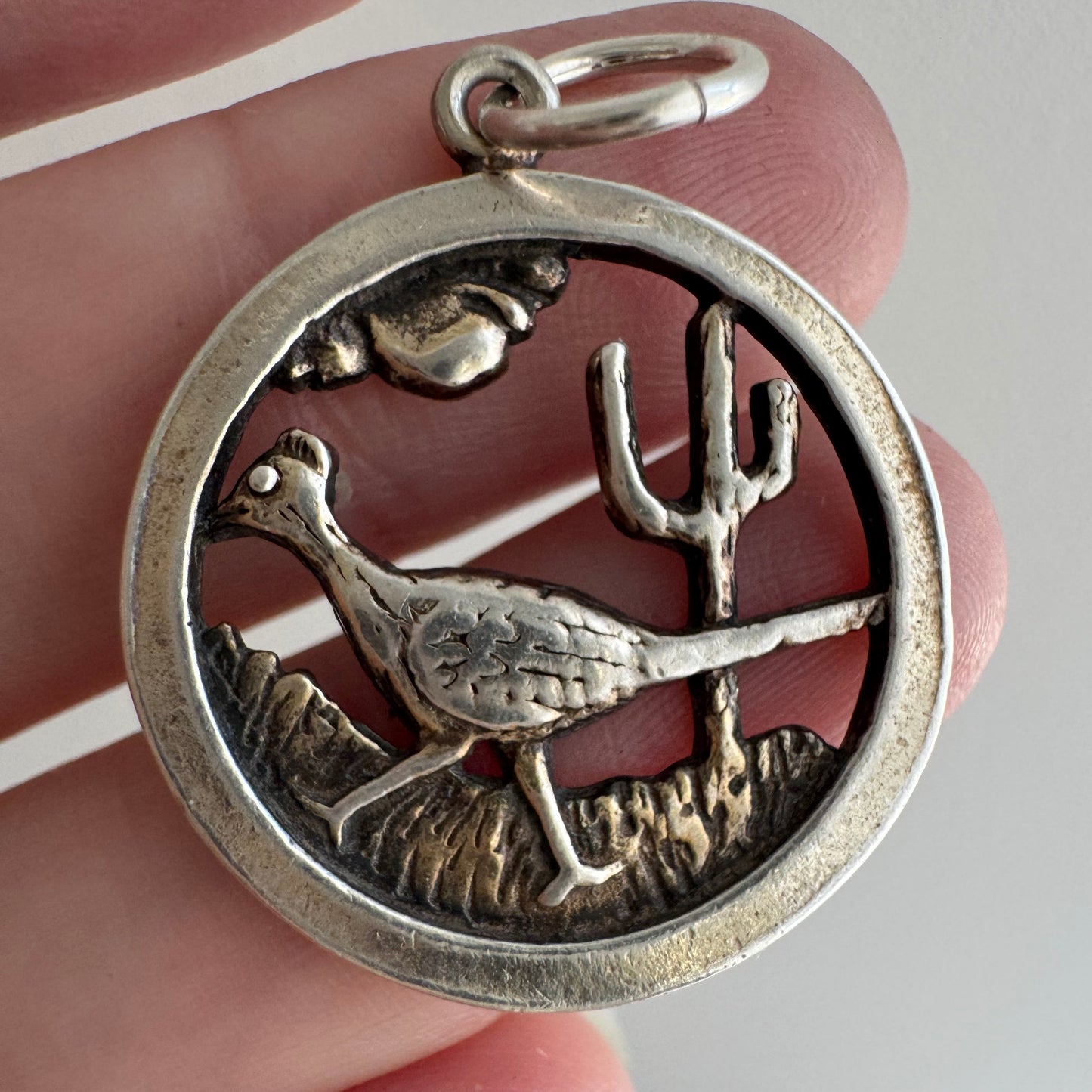 V I N T A G E // slowing down / sterling silver strutting road runner scene / a pendant
