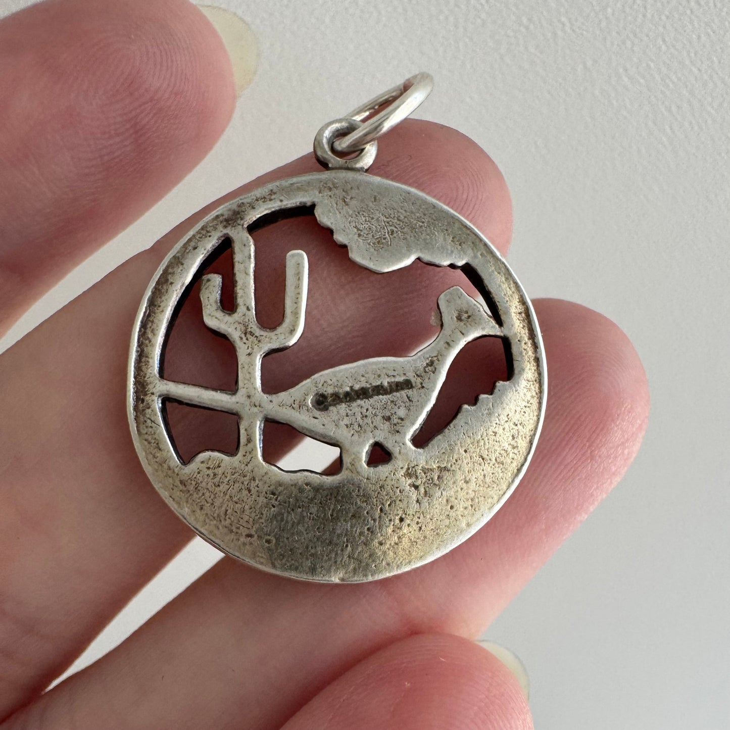 V I N T A G E // slowing down / sterling silver strutting road runner scene / a pendant