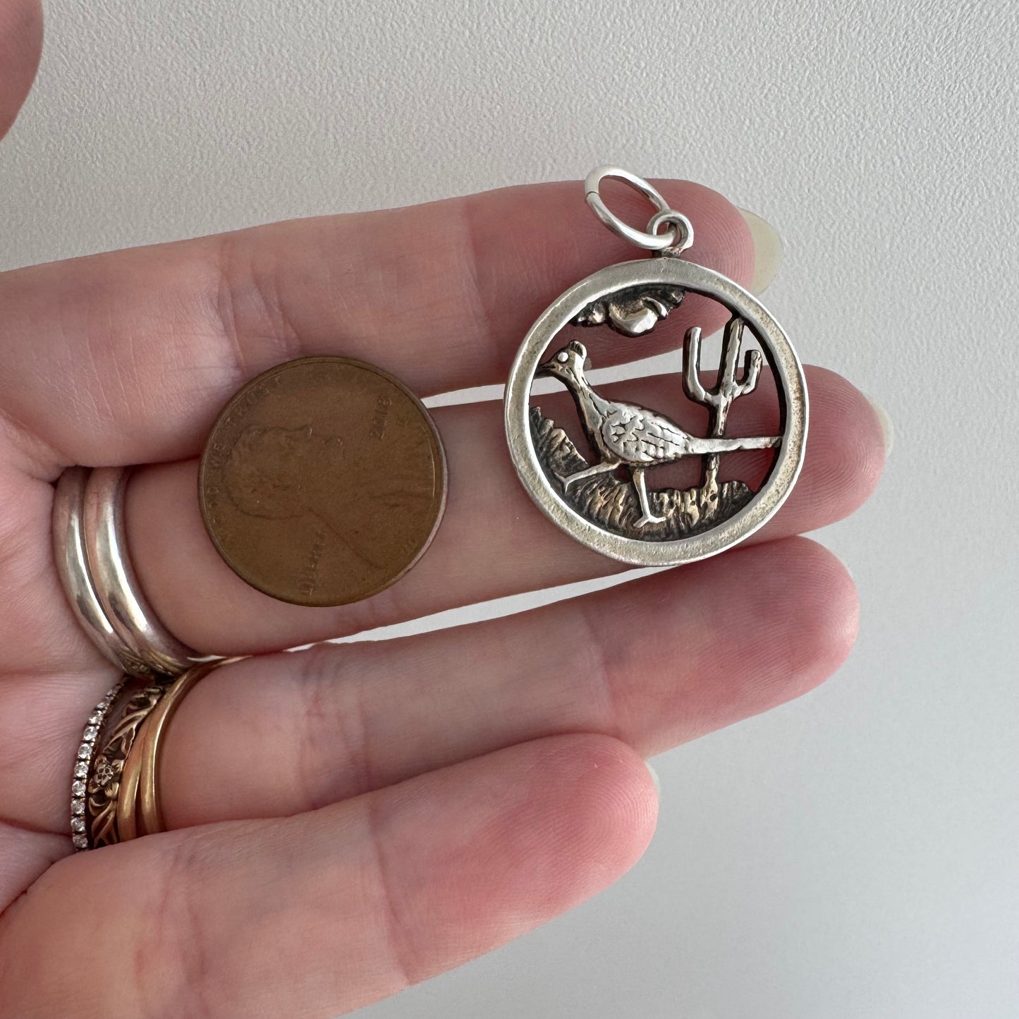 V I N T A G E // slowing down / sterling silver strutting road runner scene / a pendant