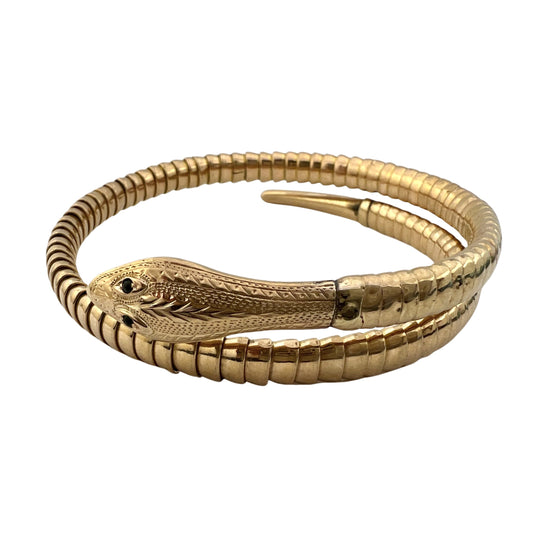 V I N T A G E // wrist protector / 9k yellow gold and emerald wrap around snake bangle / a bracelet