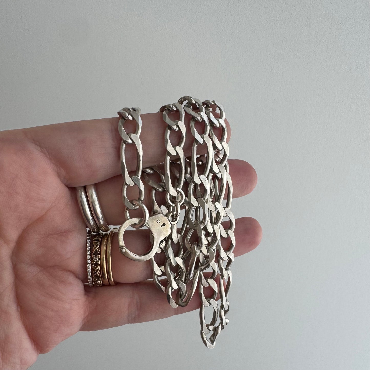 reimagined V I N T A G E // handcuff clasp / re-worked sterling silver figaro chain / 22.25", 33.7g