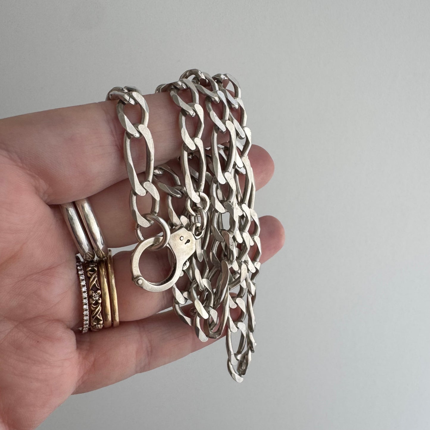 reimagined V I N T A G E // handcuff clasp / re-worked sterling silver figaro chain / 22.25", 33.7g
