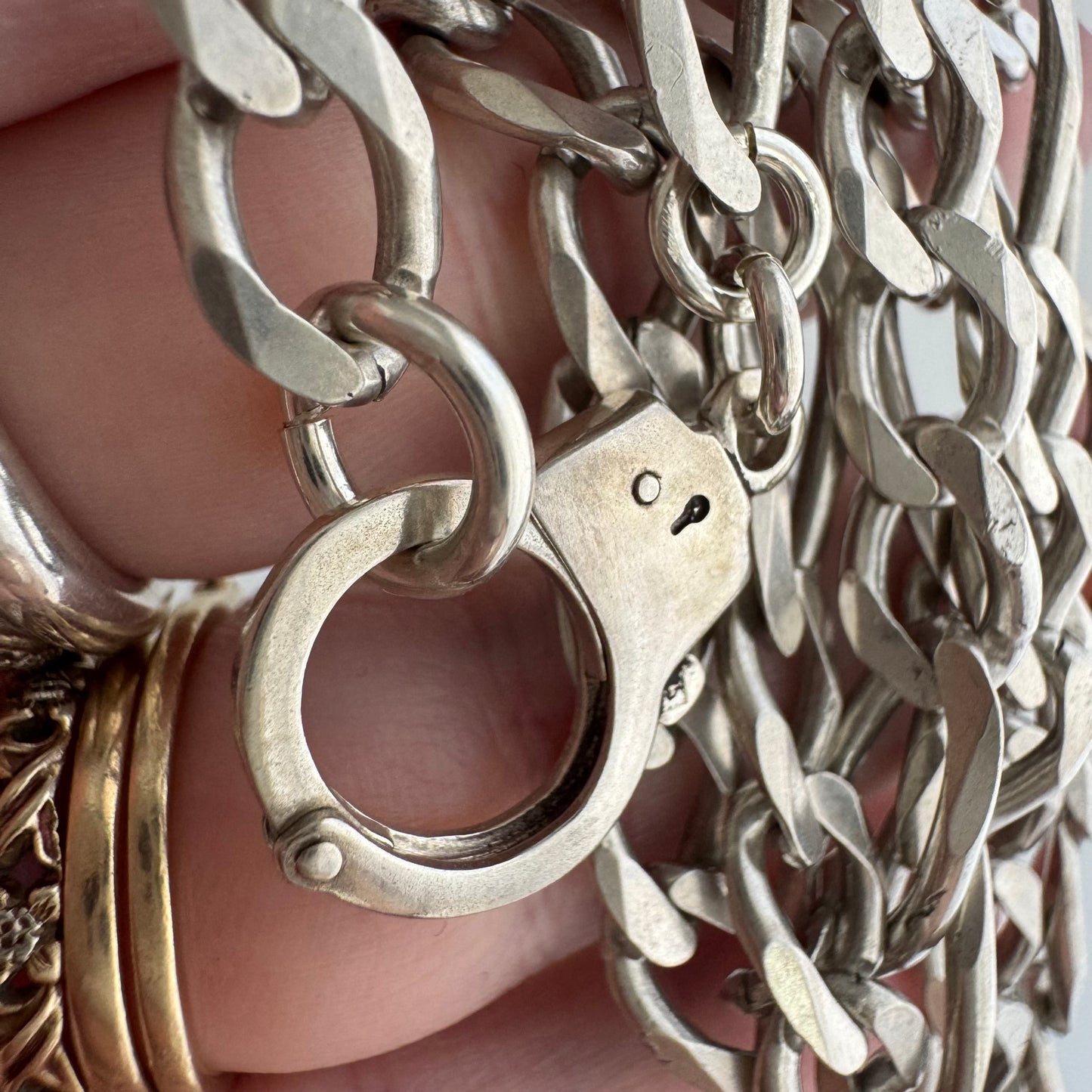reimagined V I N T A G E // handcuff clasp / re-worked sterling silver figaro chain / 22.25", 33.7g