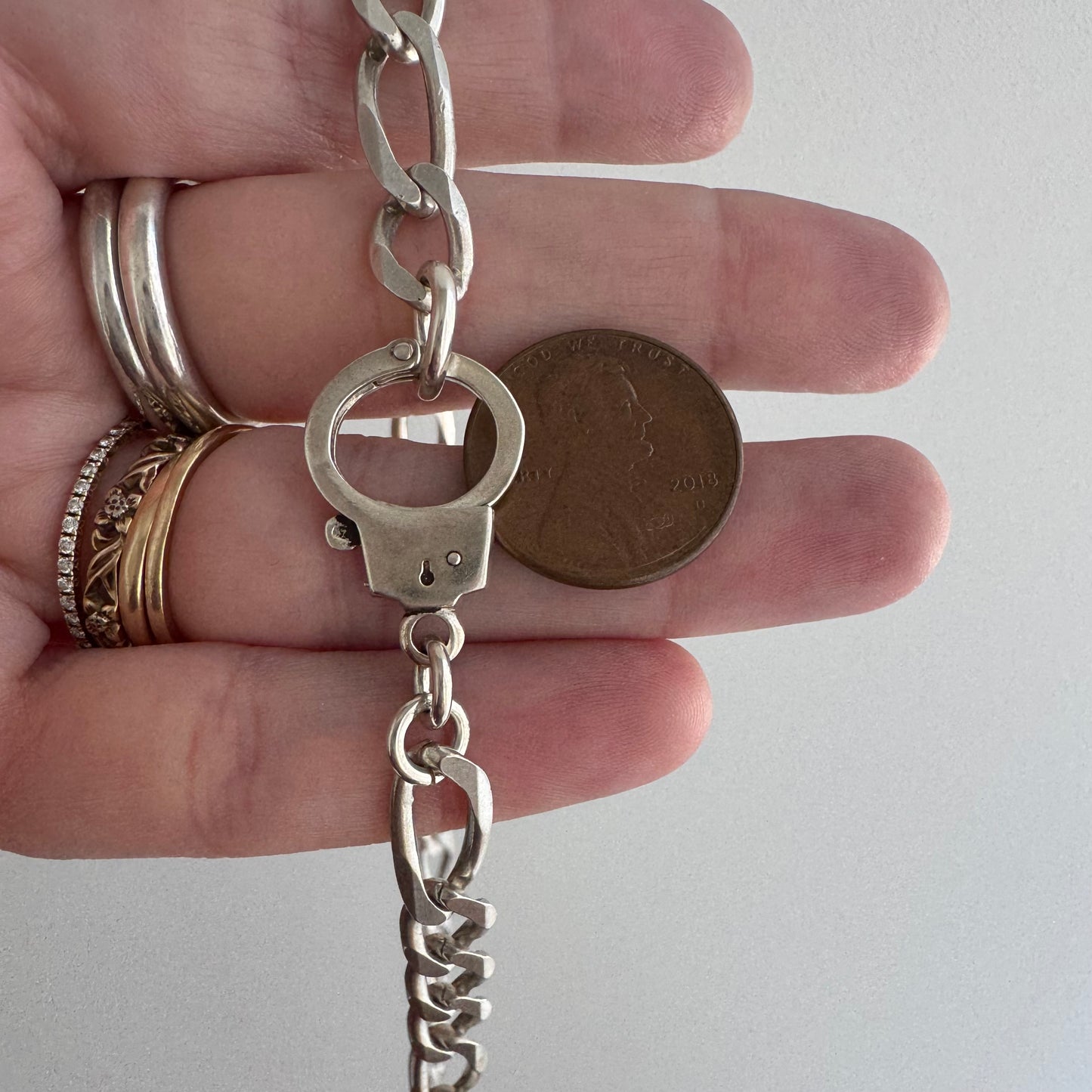 reimagined V I N T A G E // handcuff clasp / re-worked sterling silver figaro chain / 22.25", 33.7g