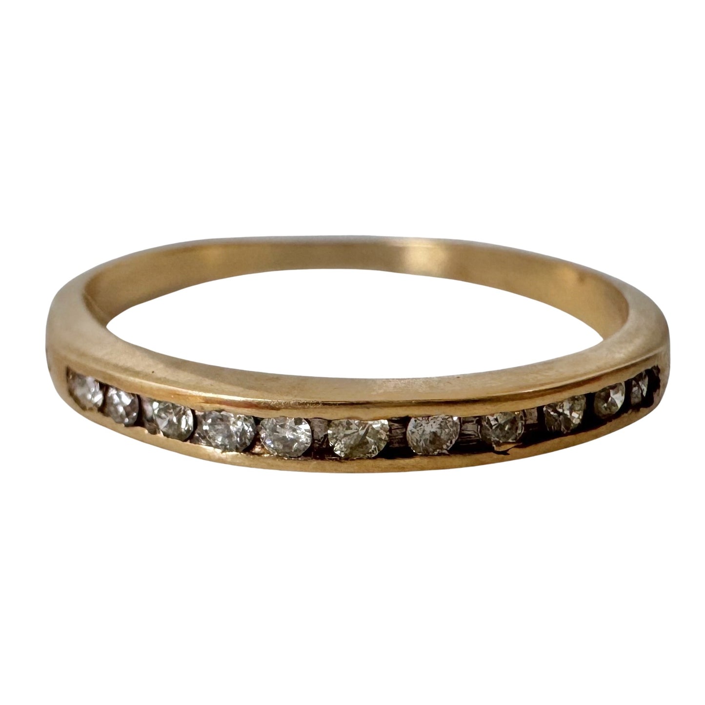 V I N T A G E // eleven sparkles / 14k yellow gold and 11 channel set diamonds / half eternity band / size 7.5