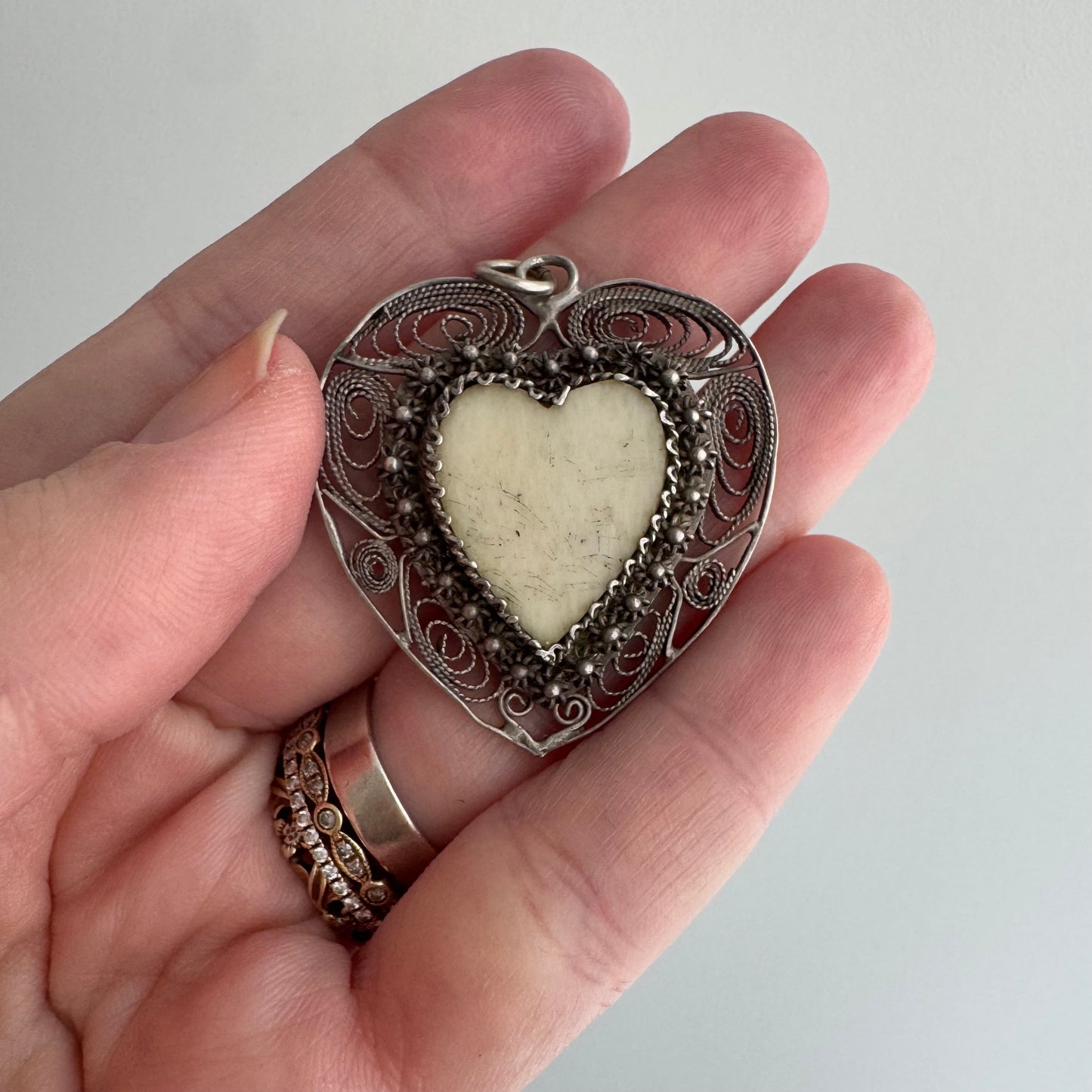 V I N T A G E // ornate heart / sterling silver filigree heart with carved bone cabochon / a pendant