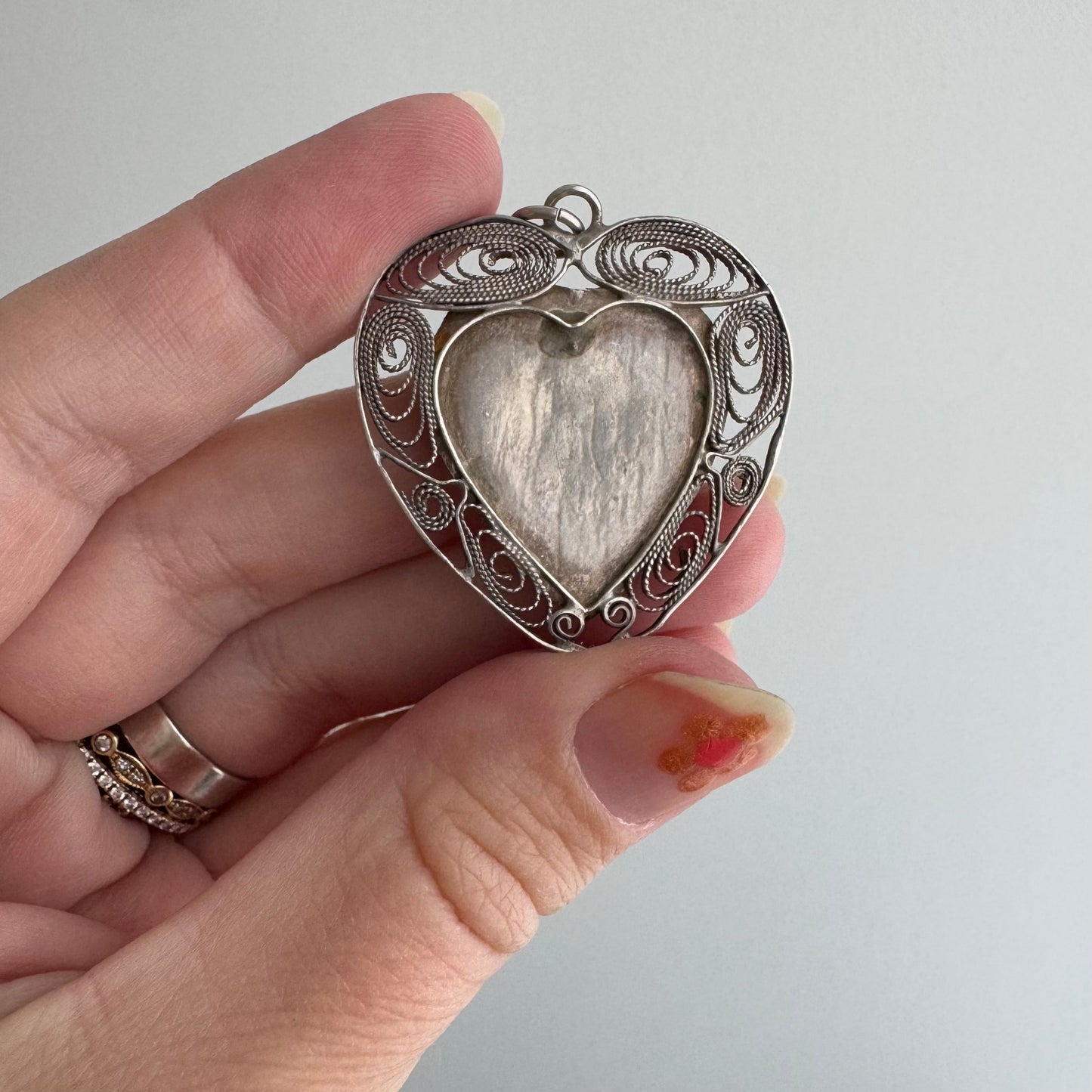 V I N T A G E // ornate heart / sterling silver filigree heart with carved bone cabochon / a pendant