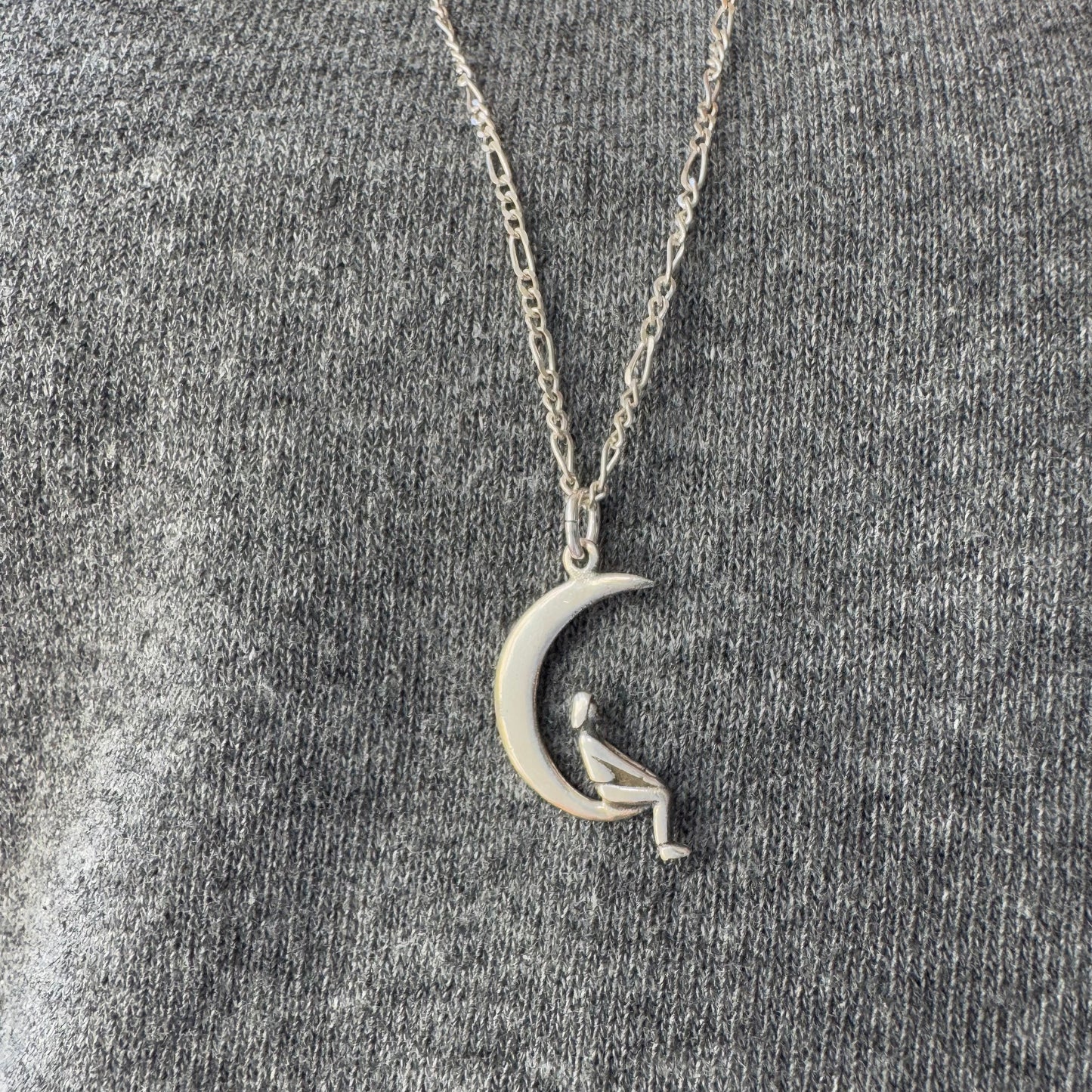 P R E - L O V E D // lunar perspective / sterling silver person sitting on a crescent moon / a pendant