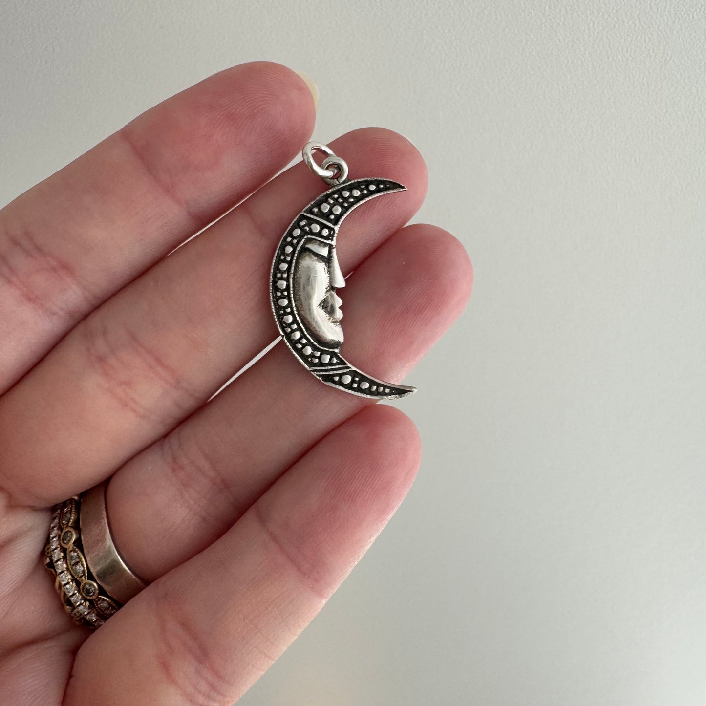 V I N T A G E // crescent mood / sterling silver tranquil crescent moon face / a pendant