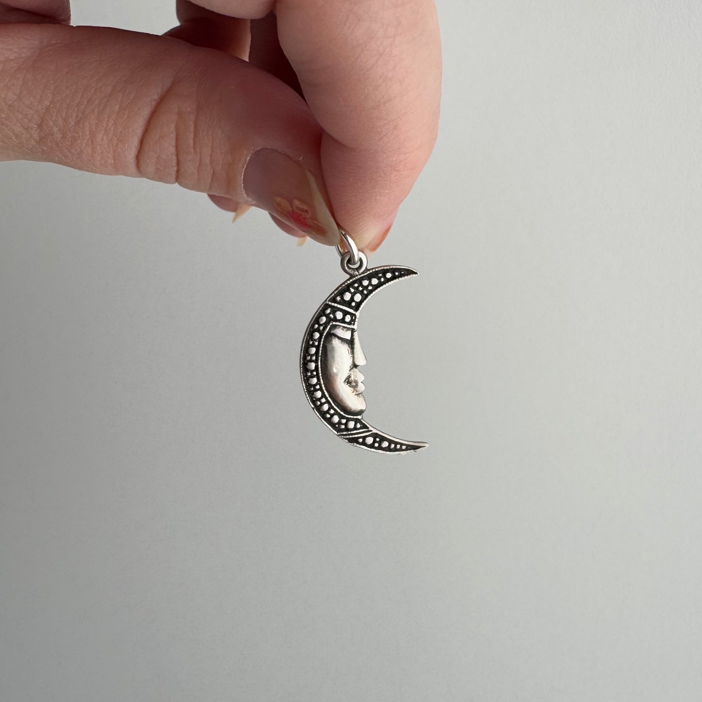 V I N T A G E // crescent mood / sterling silver tranquil crescent moon face / a pendant