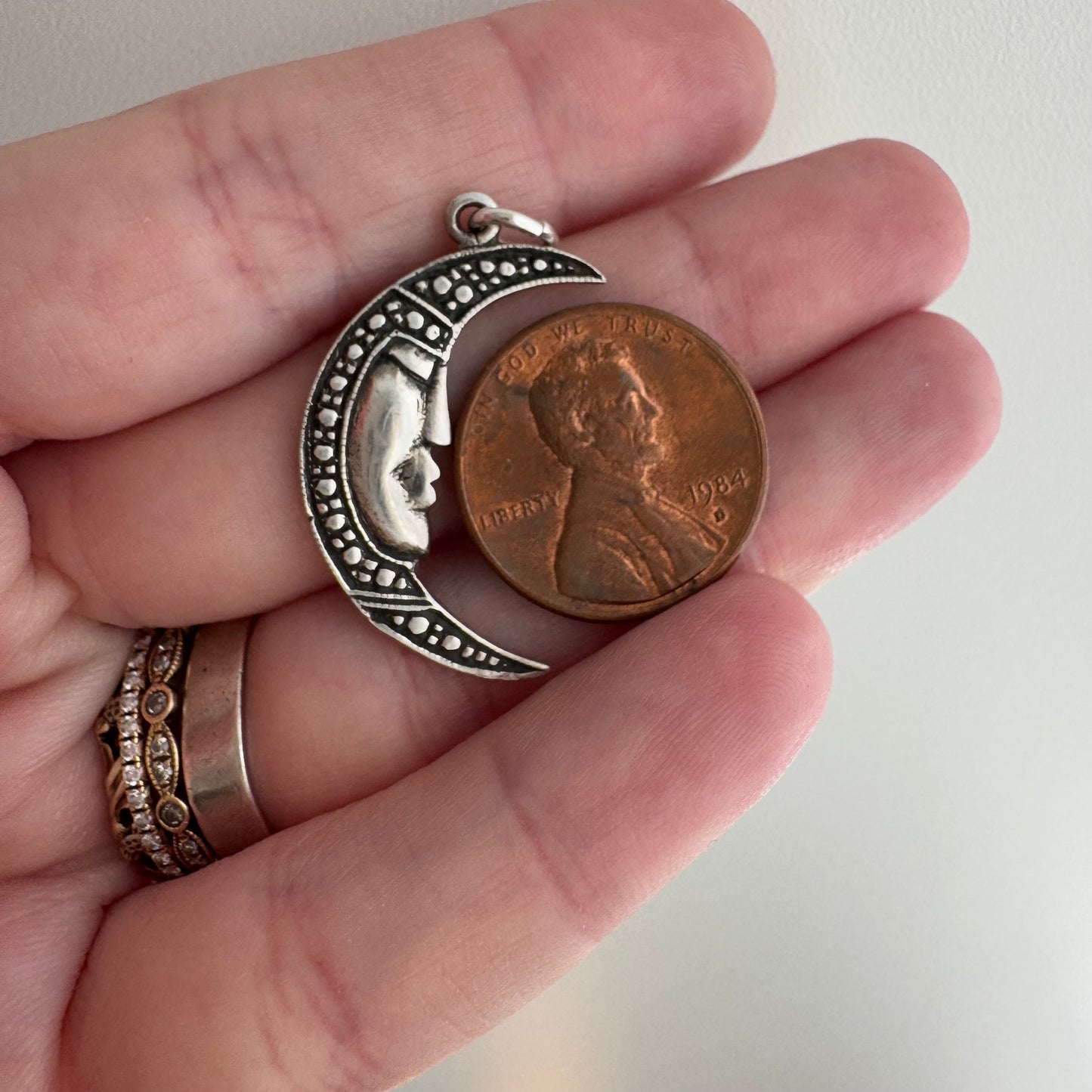 V I N T A G E // crescent mood / sterling silver tranquil crescent moon face / a pendant