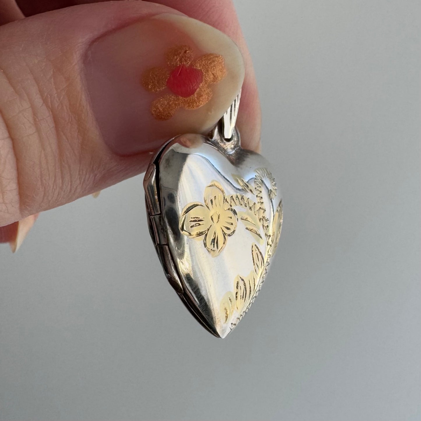 V I N T A G E // floral memories / sterling silver and gold vermeil floral heart locket / a pendant