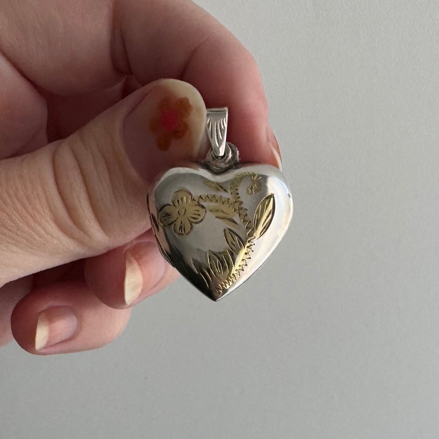 V I N T A G E // floral memories / sterling silver and gold vermeil floral heart locket / a pendant