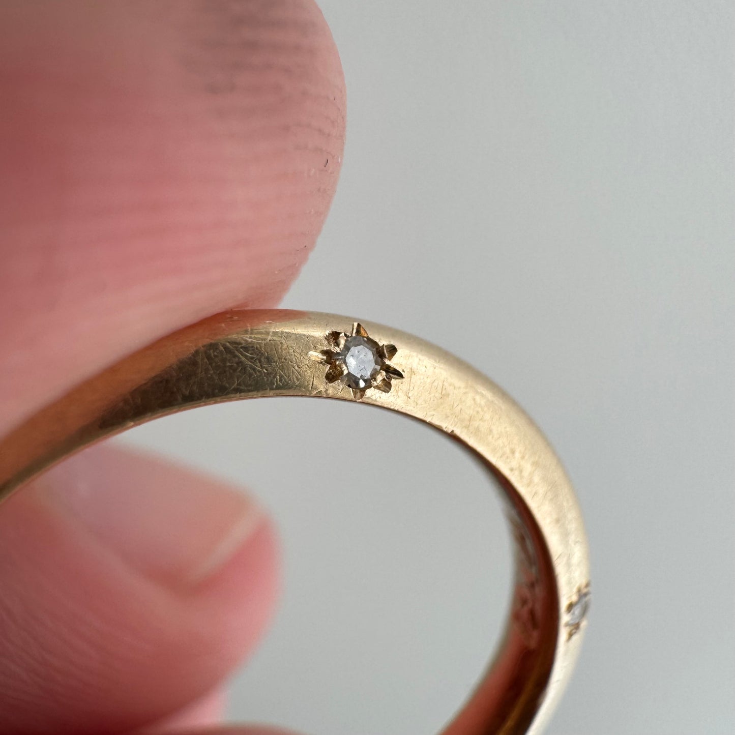 reimagined A N T I Q U E // 14k yellow gold knife edge JR Wood band with new starburst diamond / size 4.75