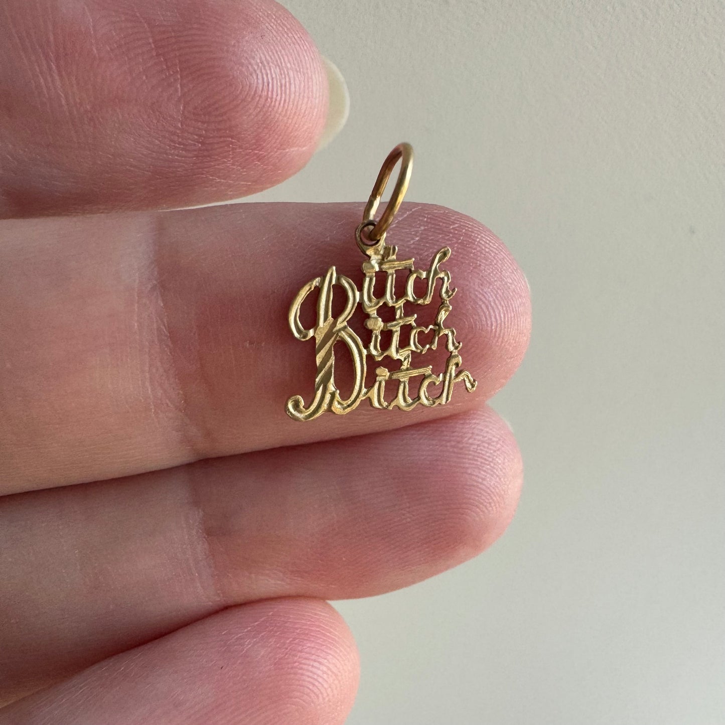 P R E - L O V E D // bitch vibe / 14k yellow gold bitch charm pendant