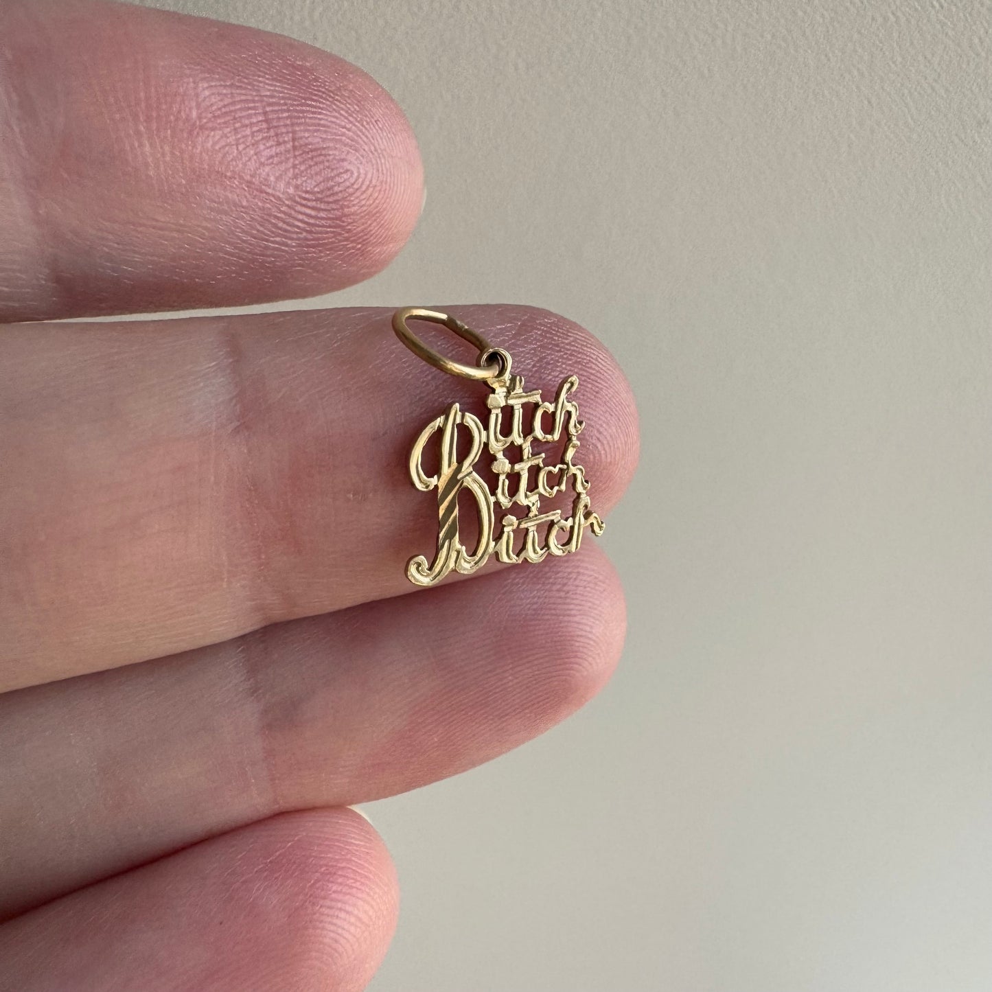 P R E - L O V E D // bitch vibe / 14k yellow gold bitch charm pendant