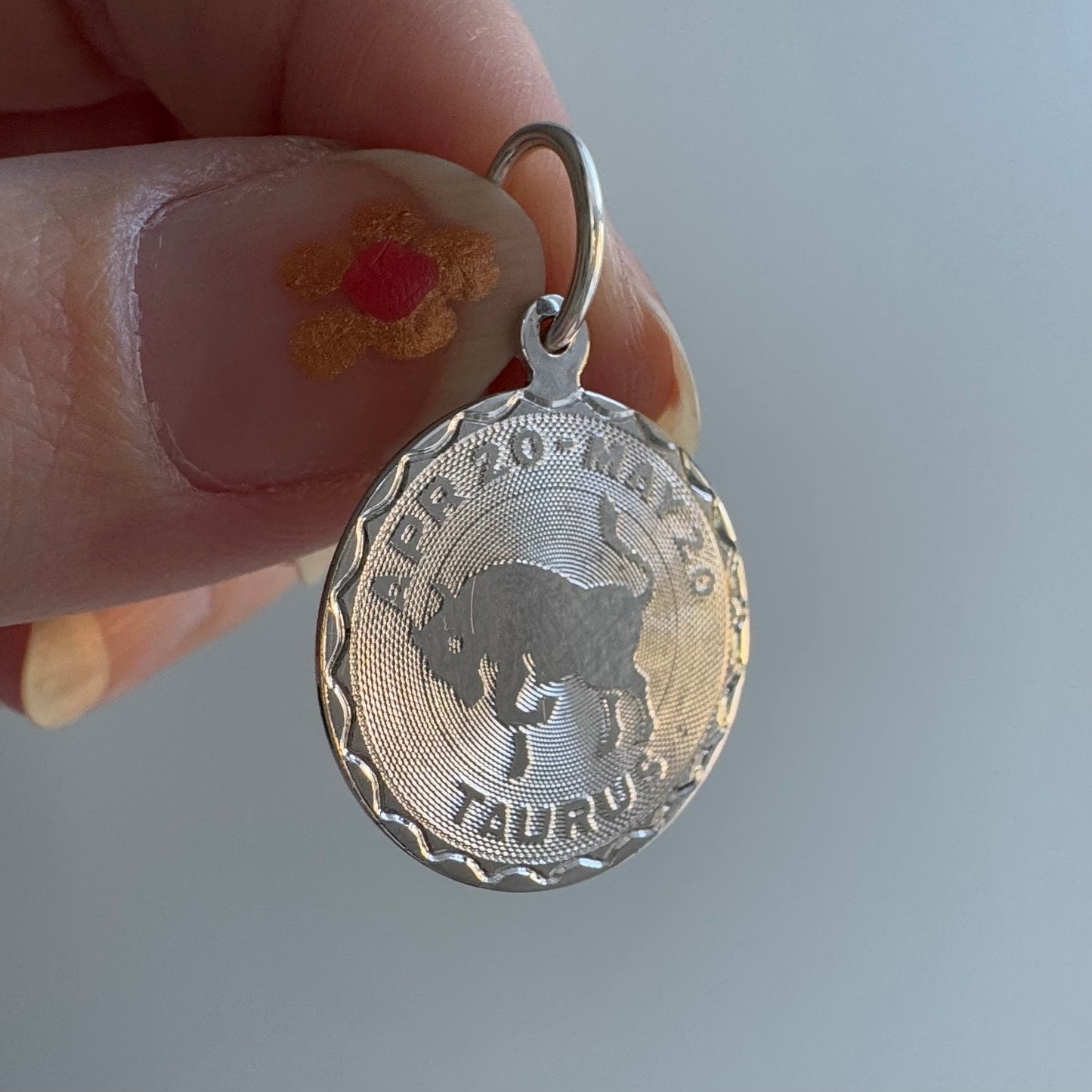 V I N T A G E // celestial bull / sterling silver rhodium plated Taurus disc / a pendant