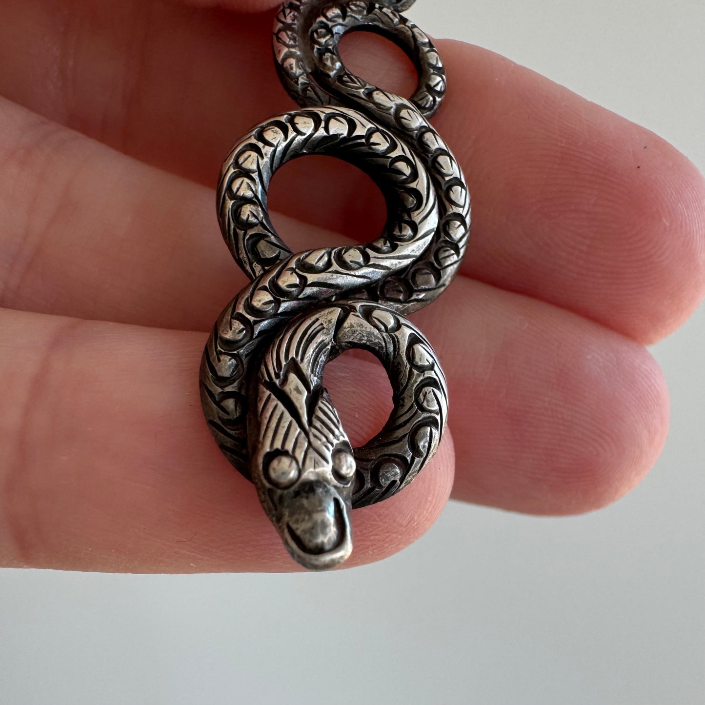 V I N T A G E // looping snake / sterling silver stamped and engraved snake / a pendant