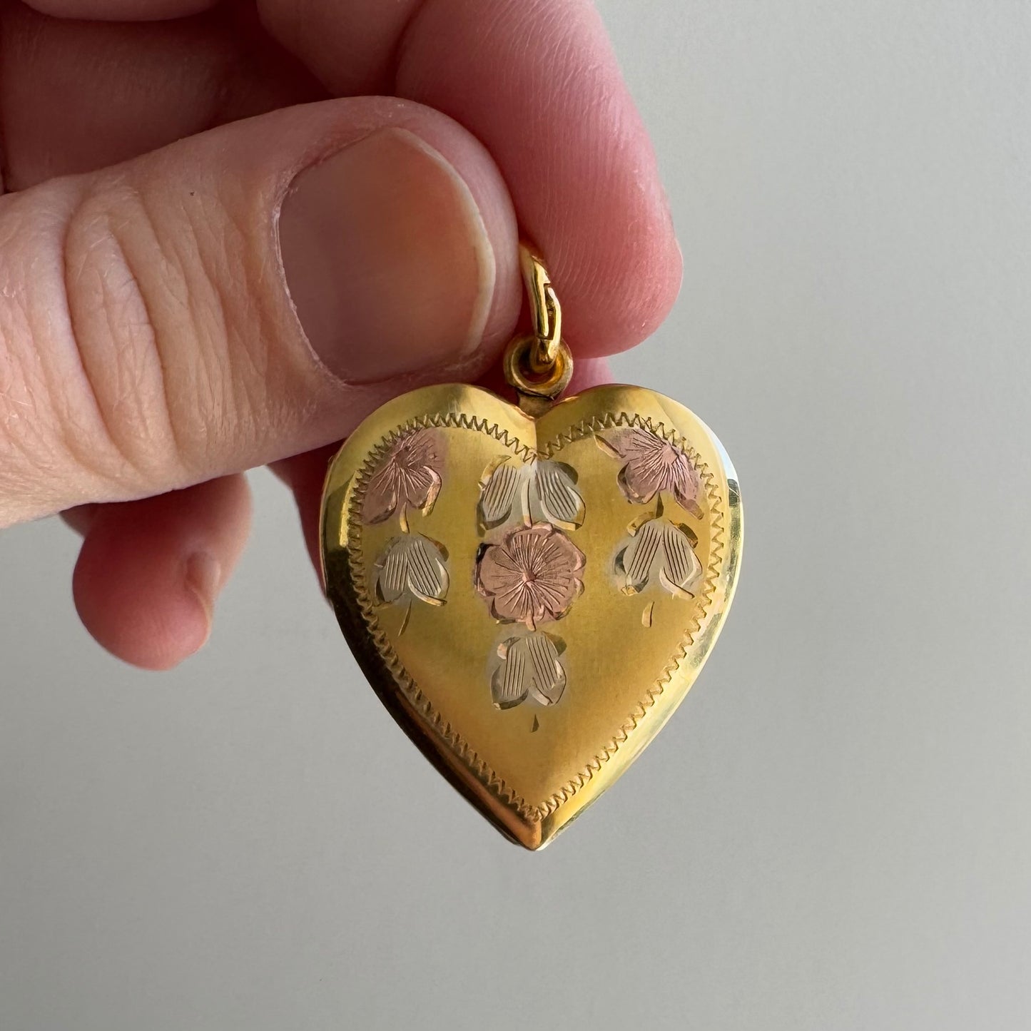 V I N T A G E // retro flower cascade / 1940s gold over sterling silver heart locket / a pendant